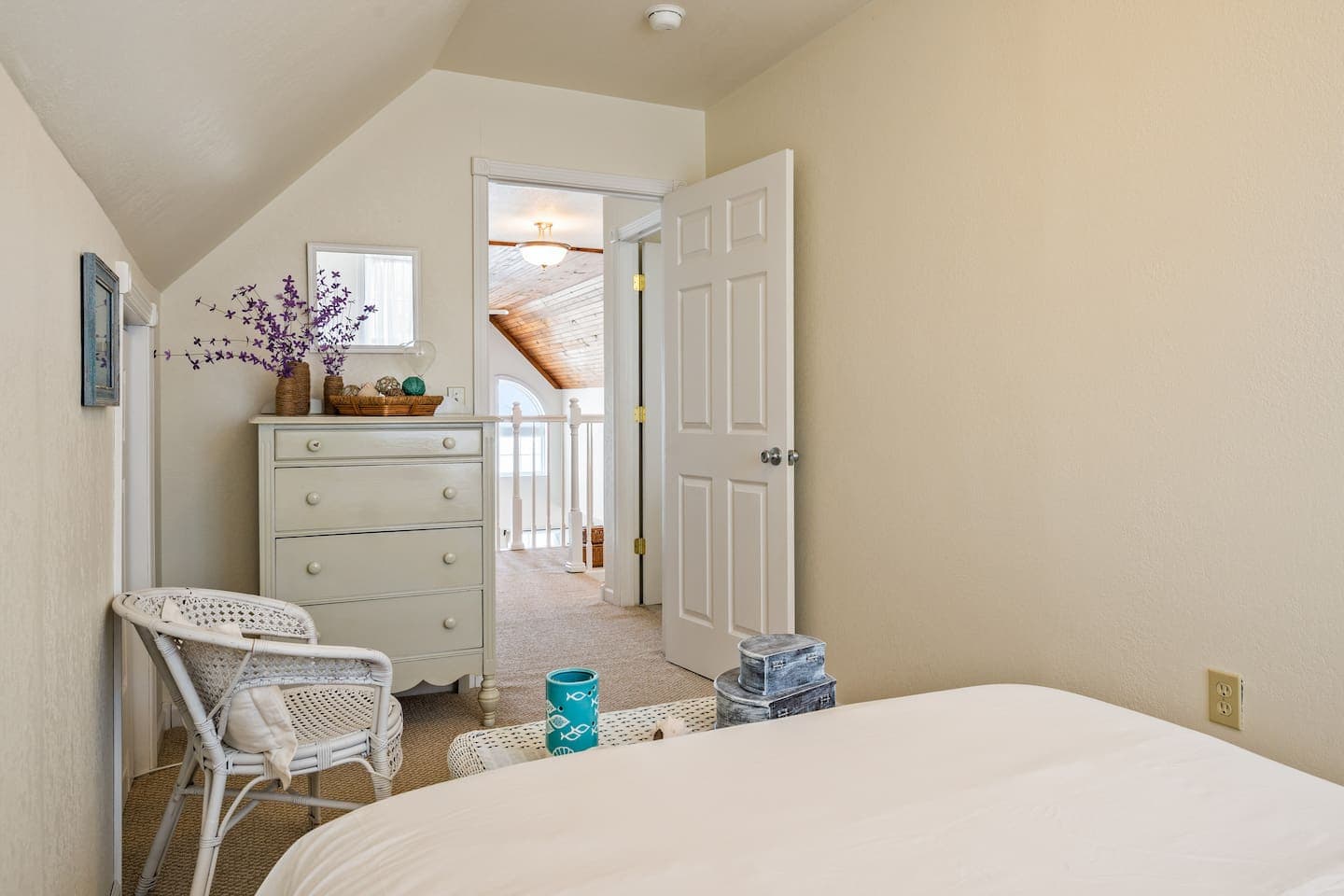 Bedroom dresser with mirror and decorative accents