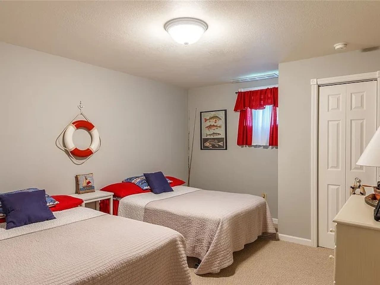 Basement bedroom with two full-size beds