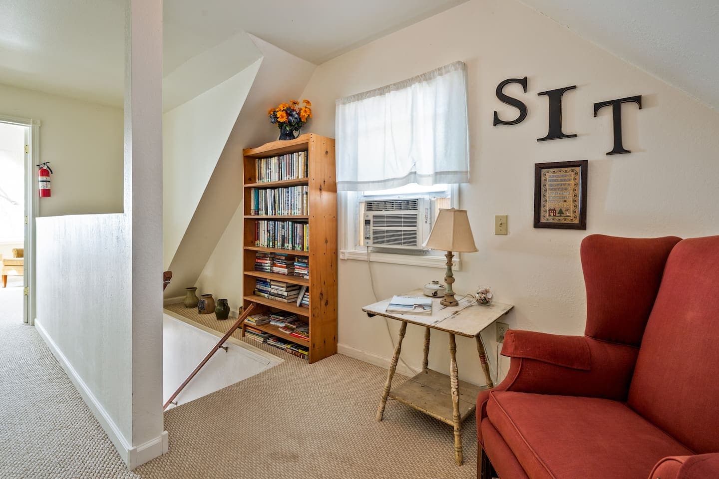Reading nook with armchair and bookcase