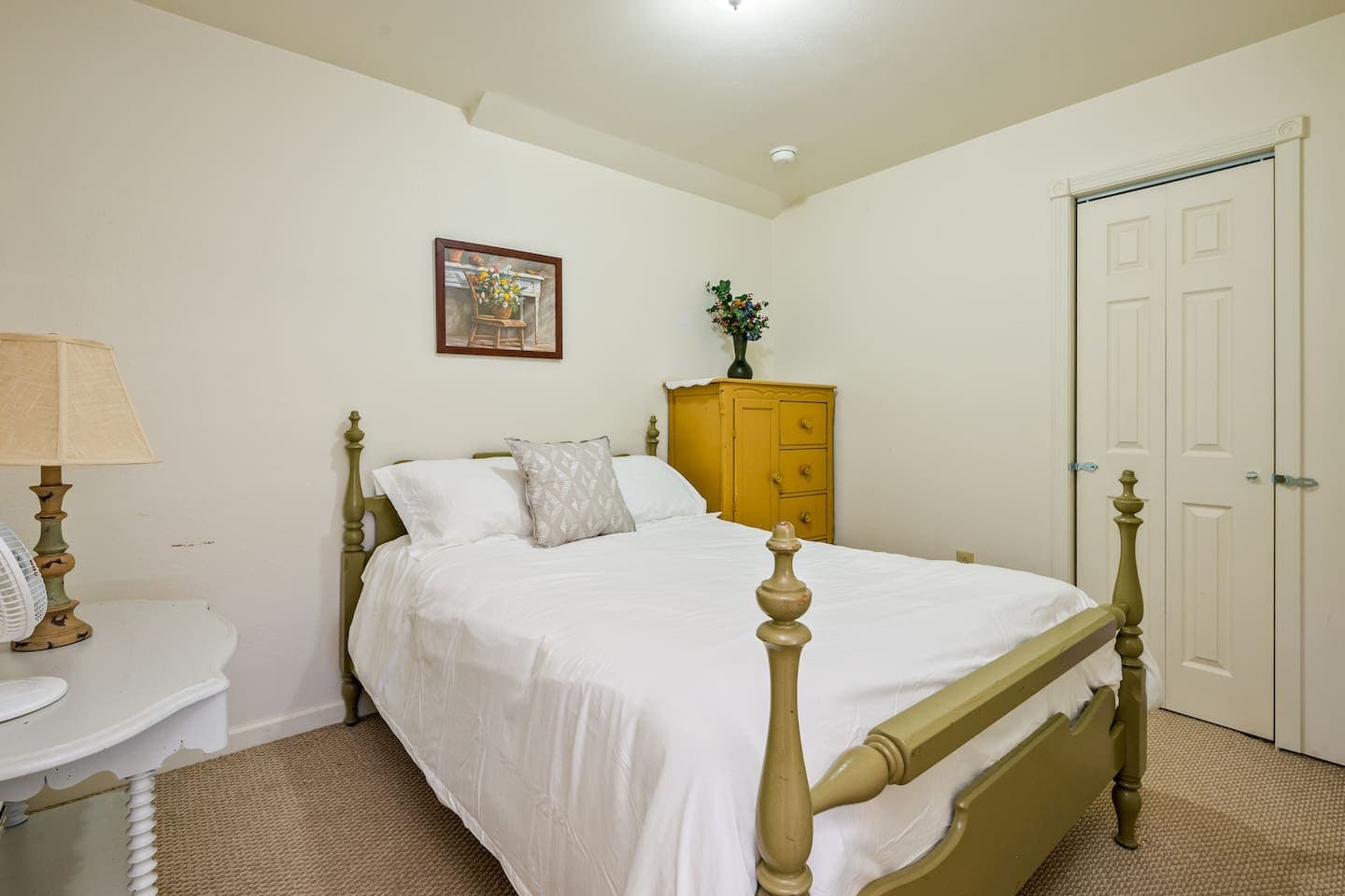 Twin bedroom with brass bed frame