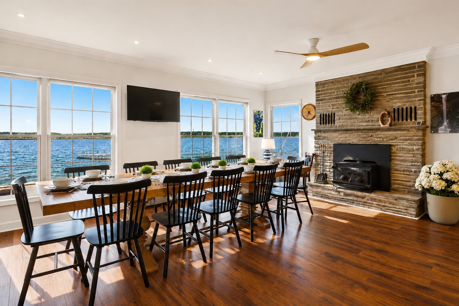 Lakeview dining area beside the stone fireplace