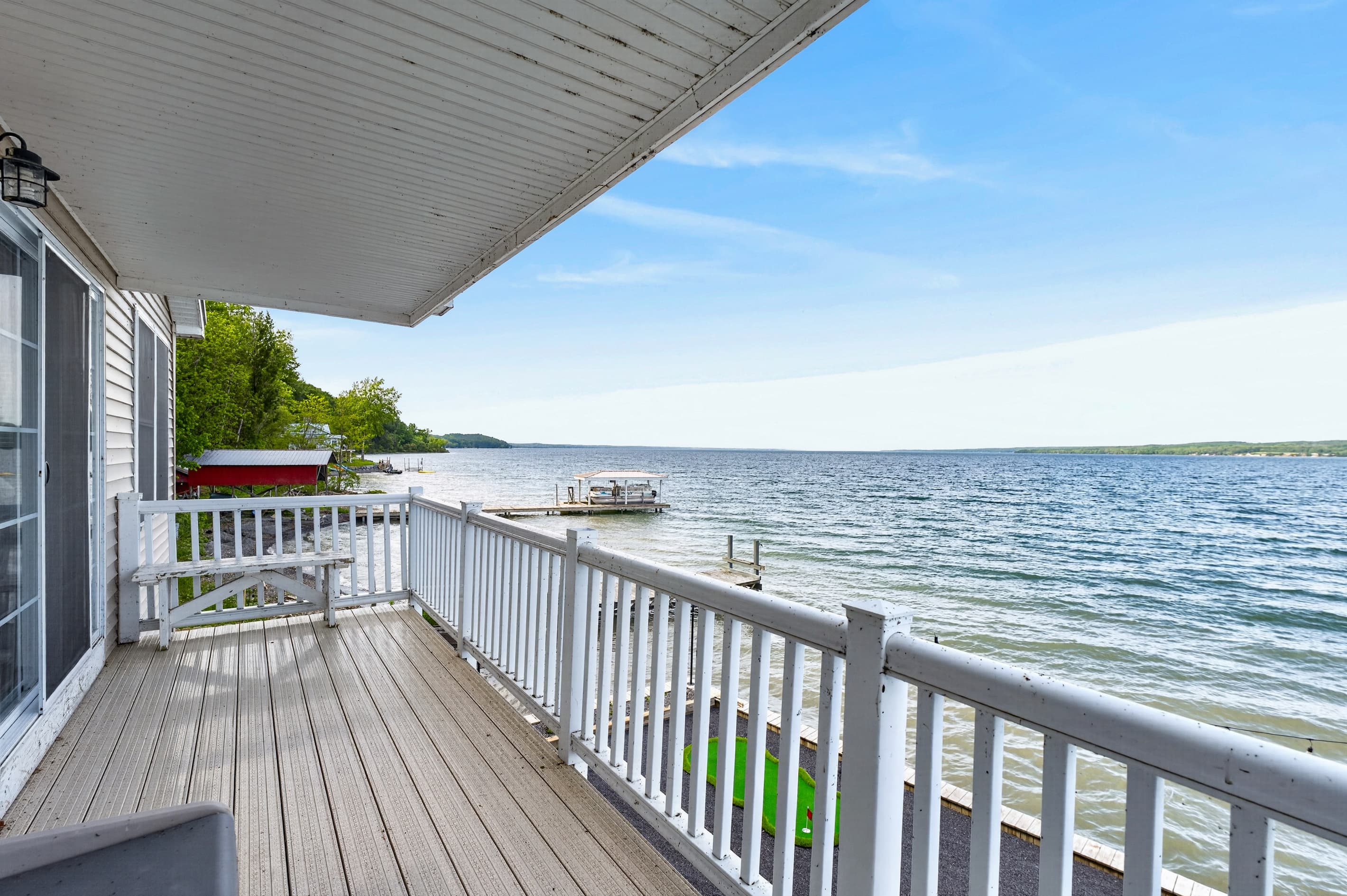 Covered side deck overlooking the water