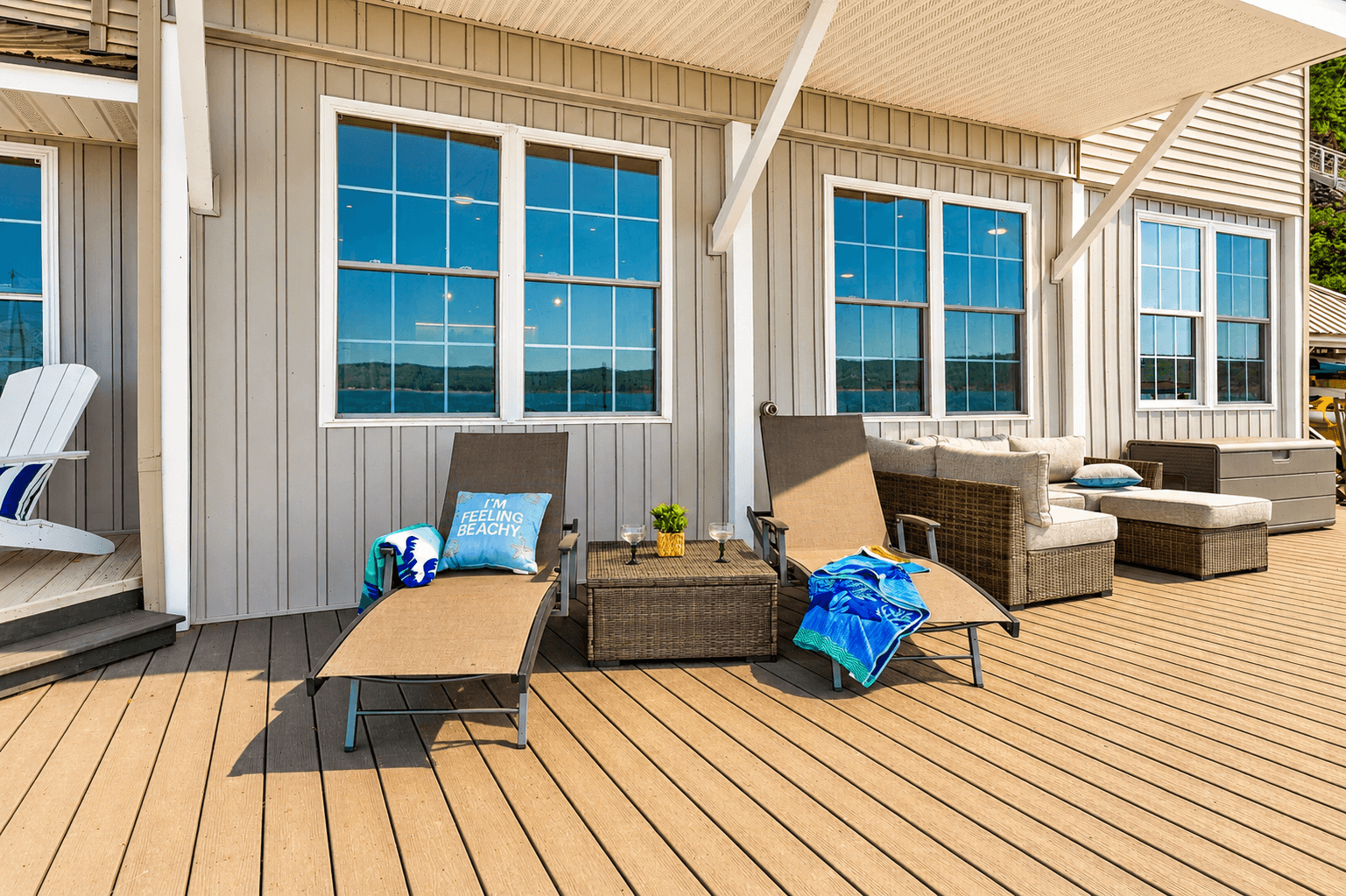 Deck lounge area with cushioned seating