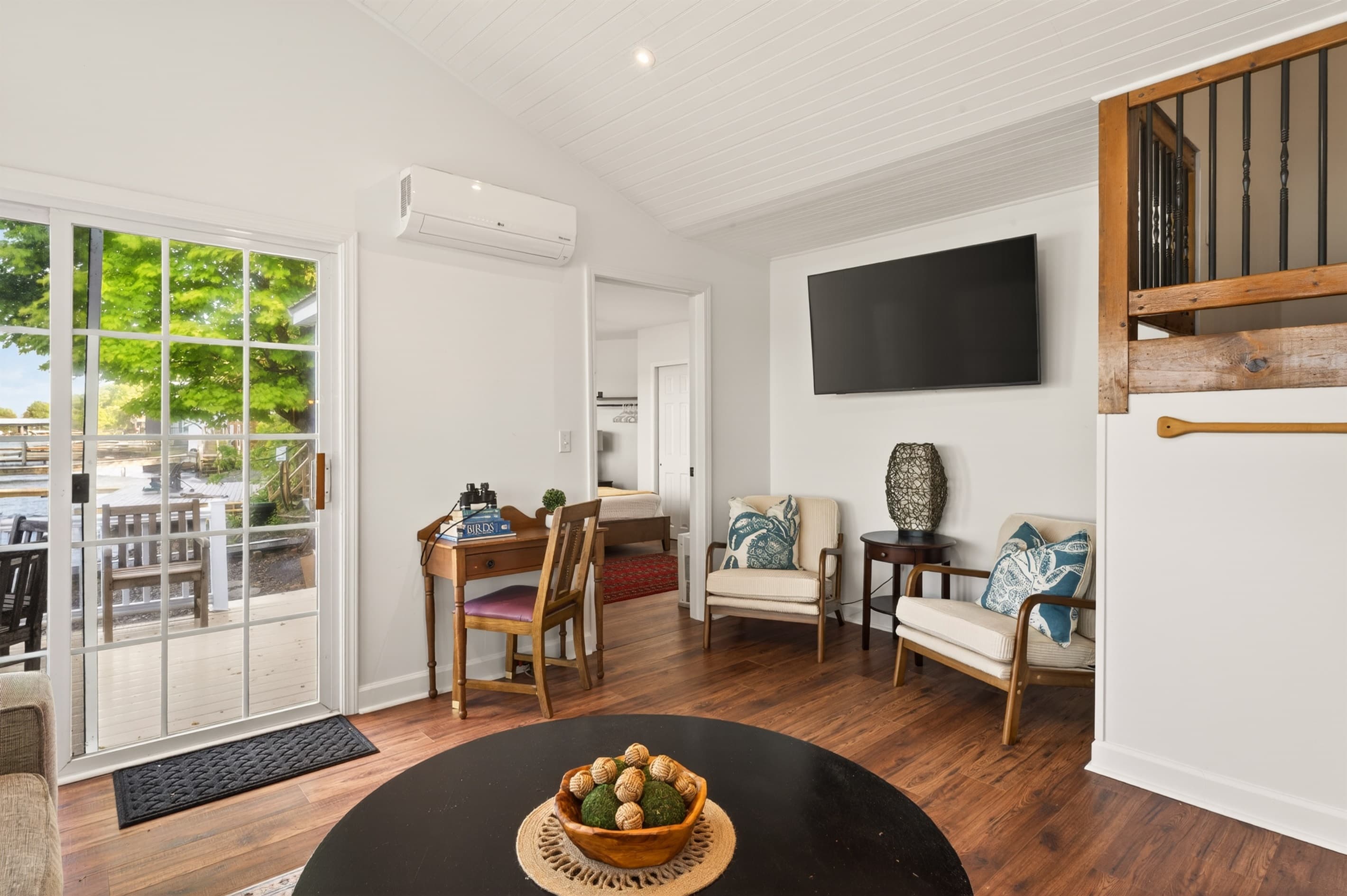 Sitting area with television and small table