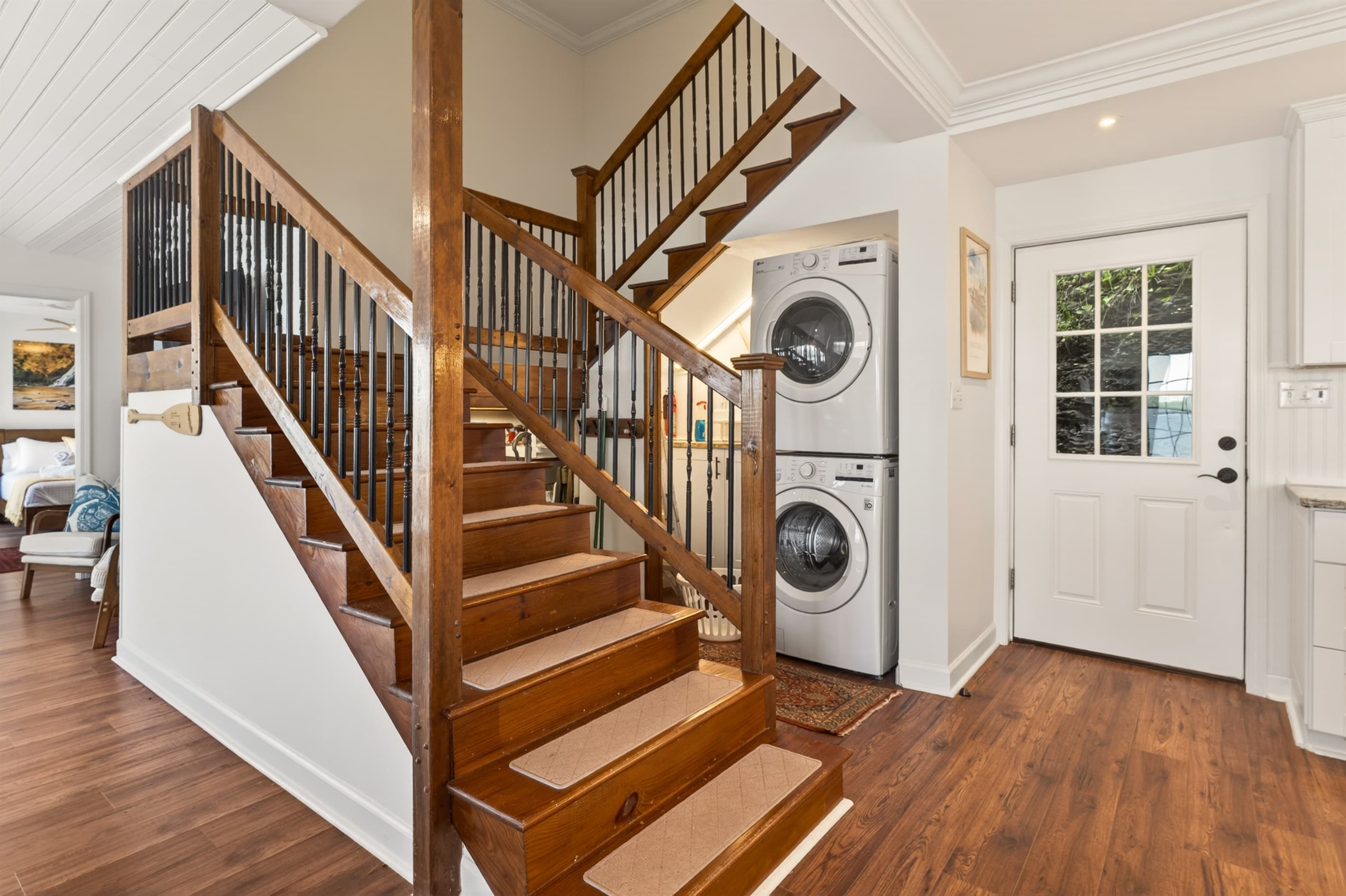 Stairway with stacked washer and dryer