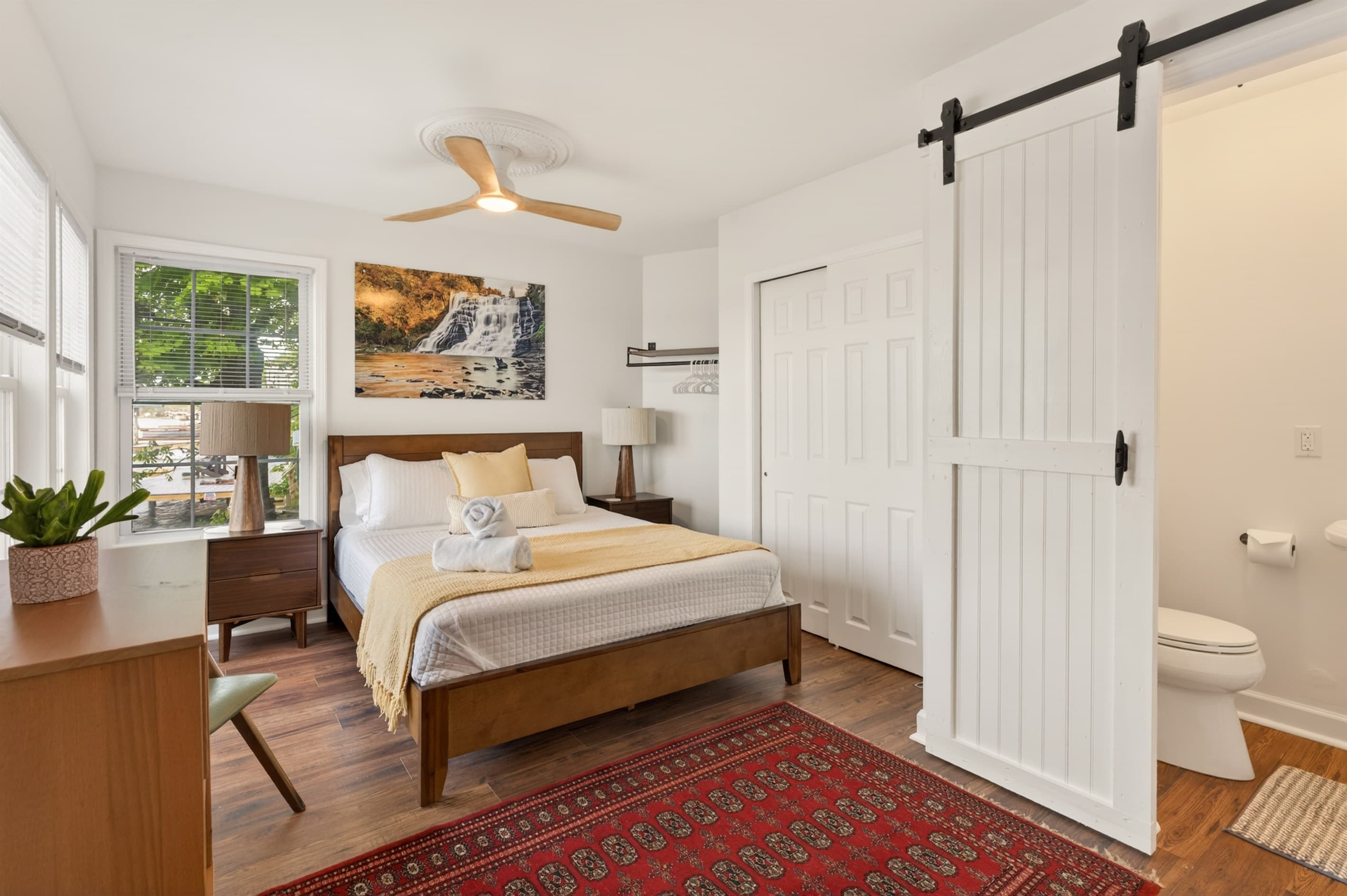 Bedroom with large closet and bathroom
