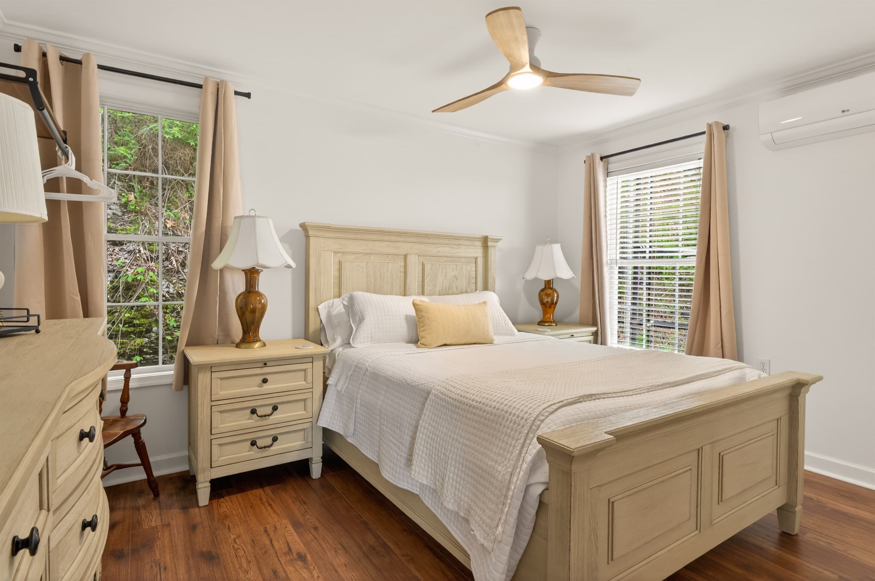 Bedroom with matching nightstands and dresser