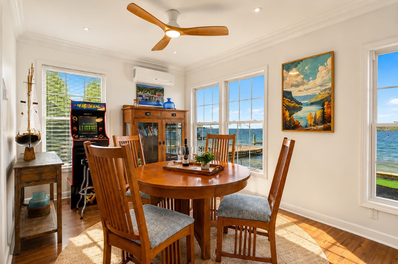 Sunlit dining nook with water views