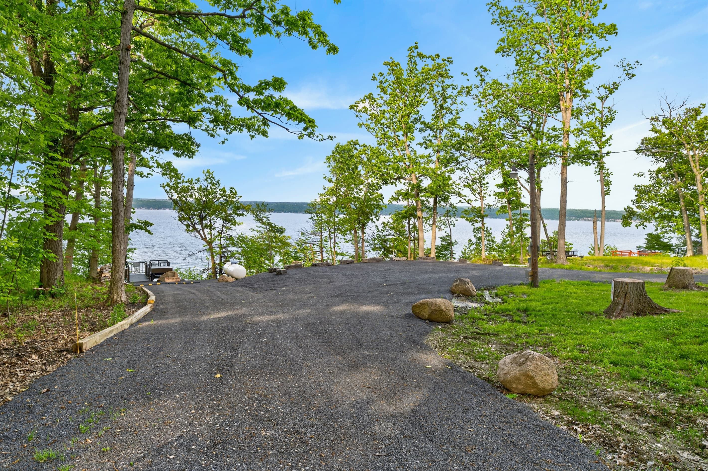 Driveway entrance with lake views ahead
