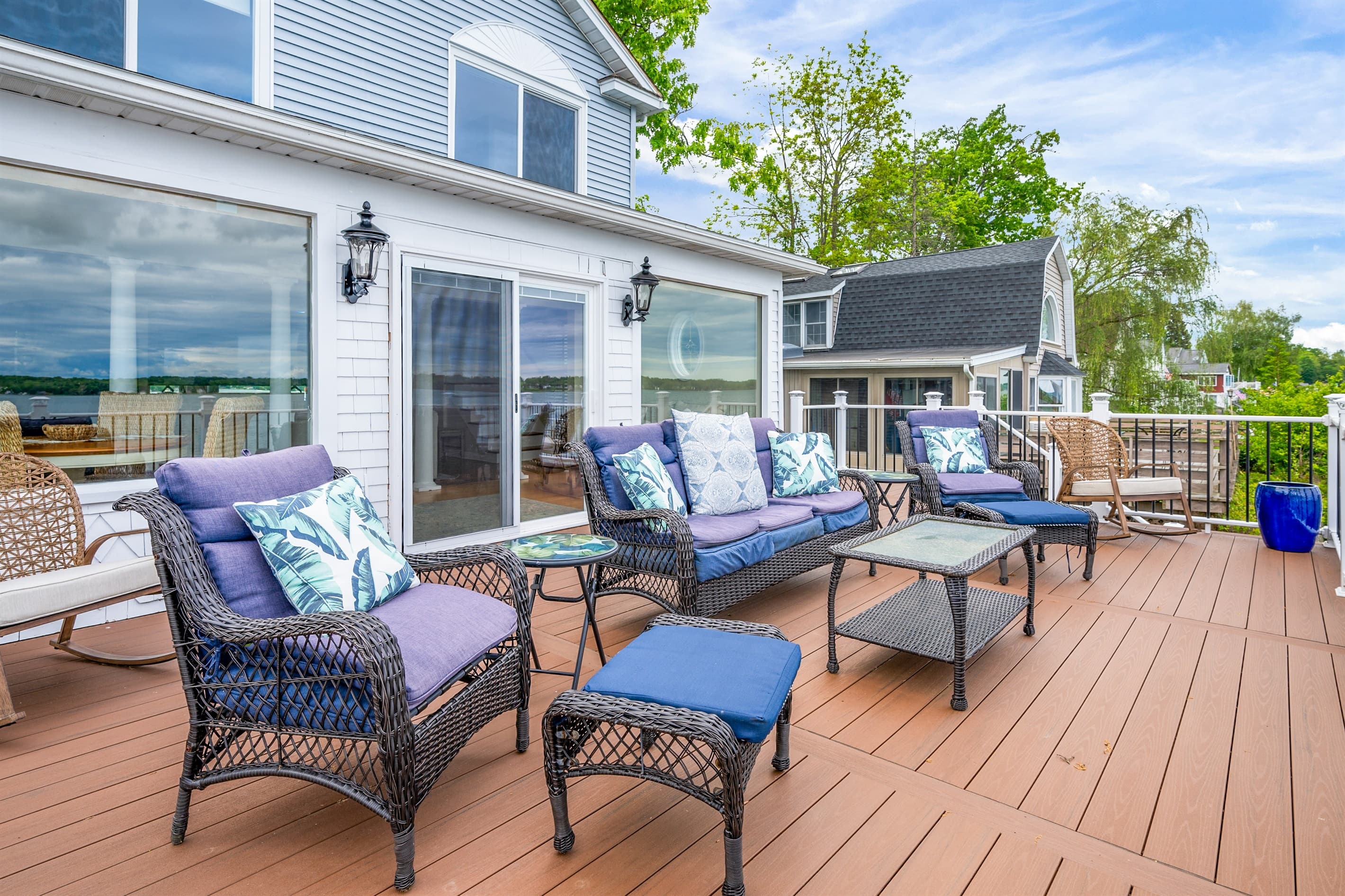 Outdoor lounge seating beside the house