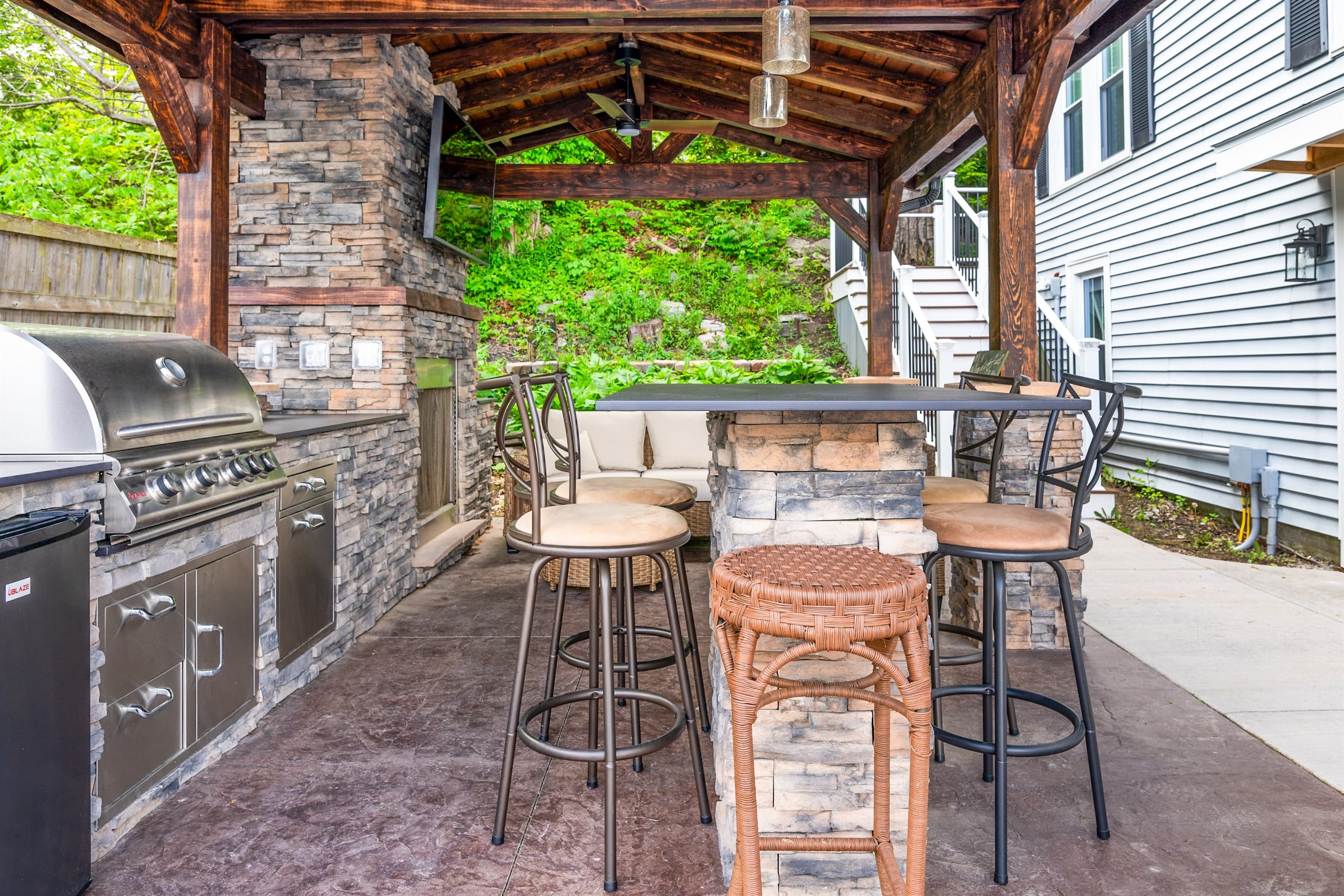Covered dining area with built-in grill