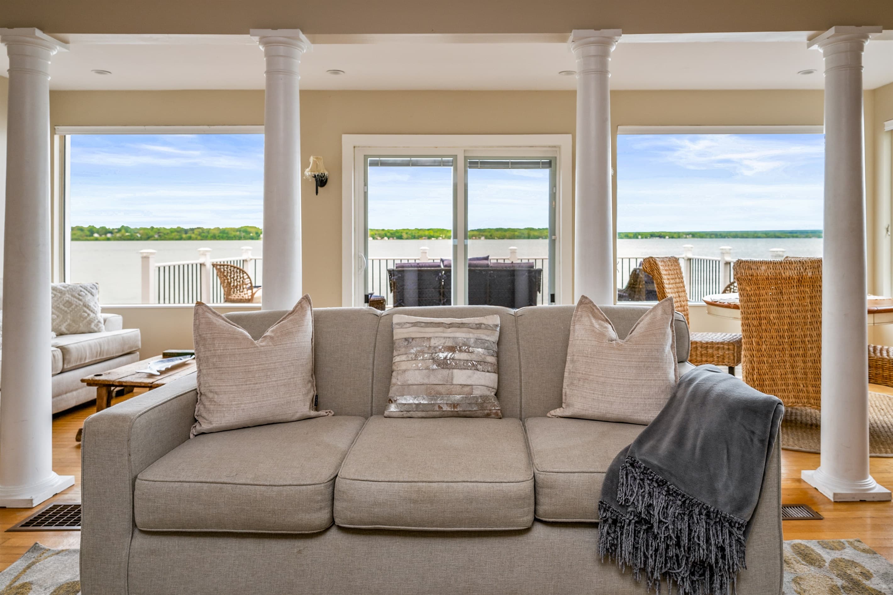 Sofa facing floor-to-ceiling windows