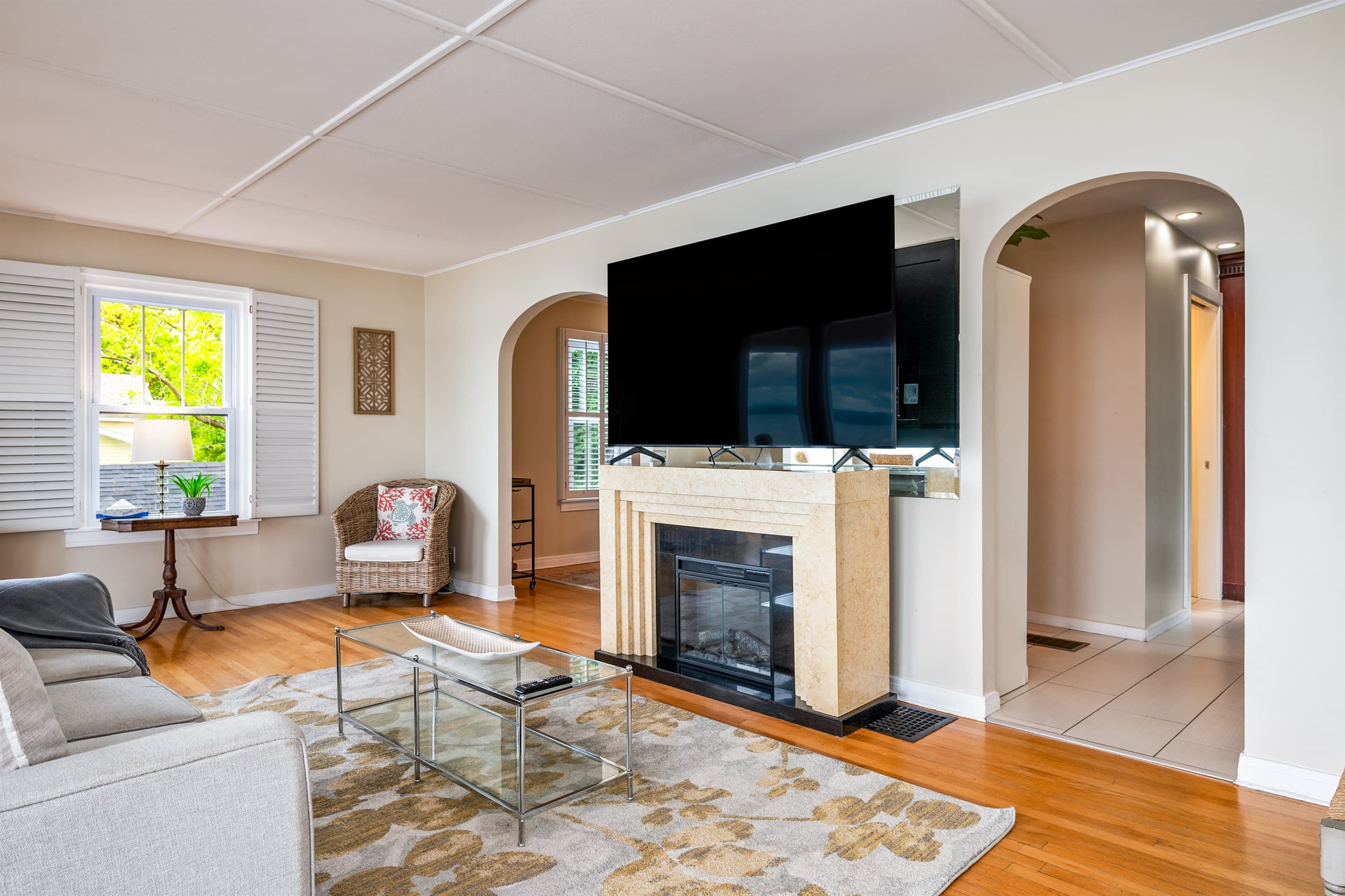 Television mounted above the fireplace