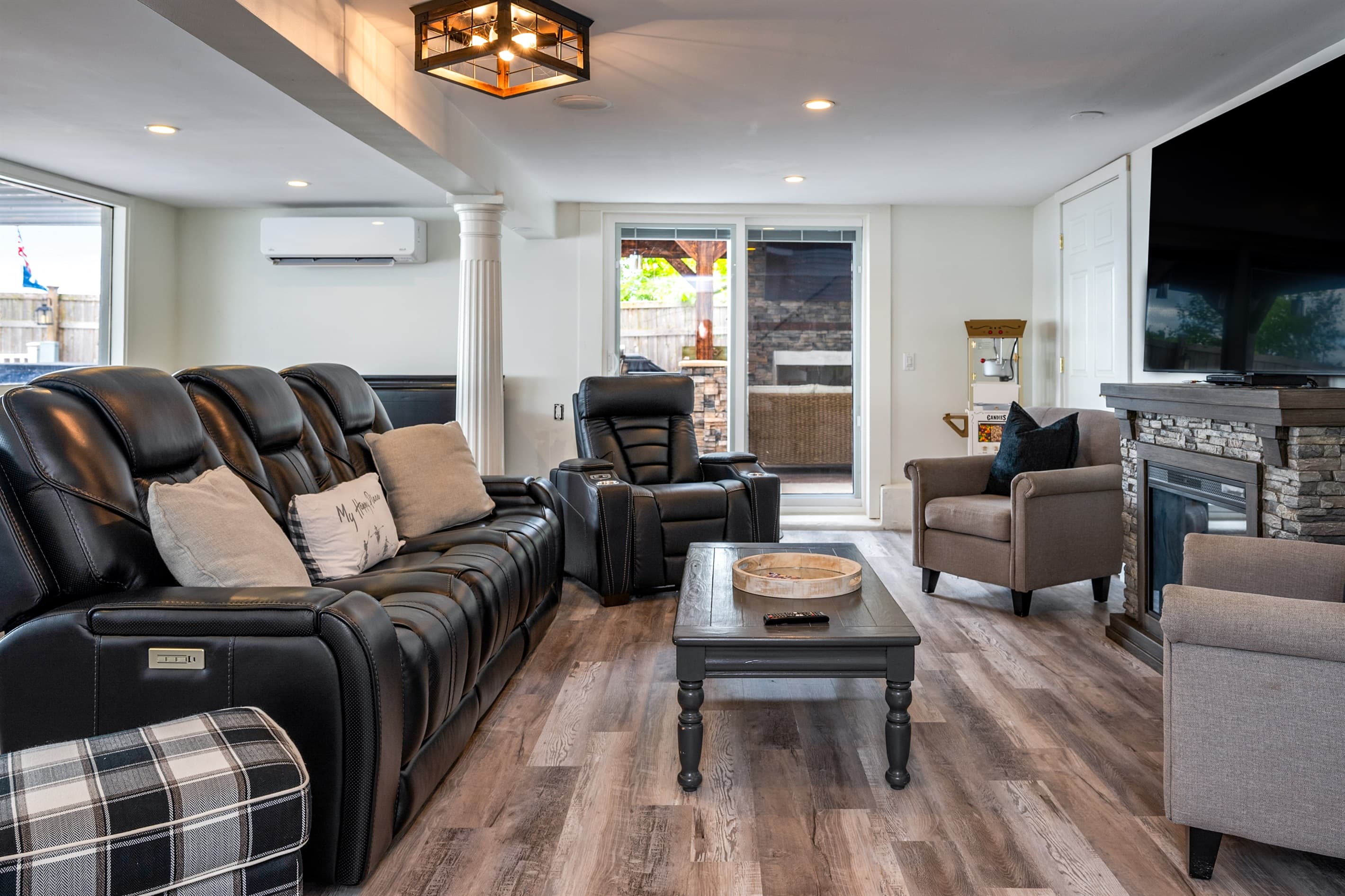 Lower-level lounge with leather recliners