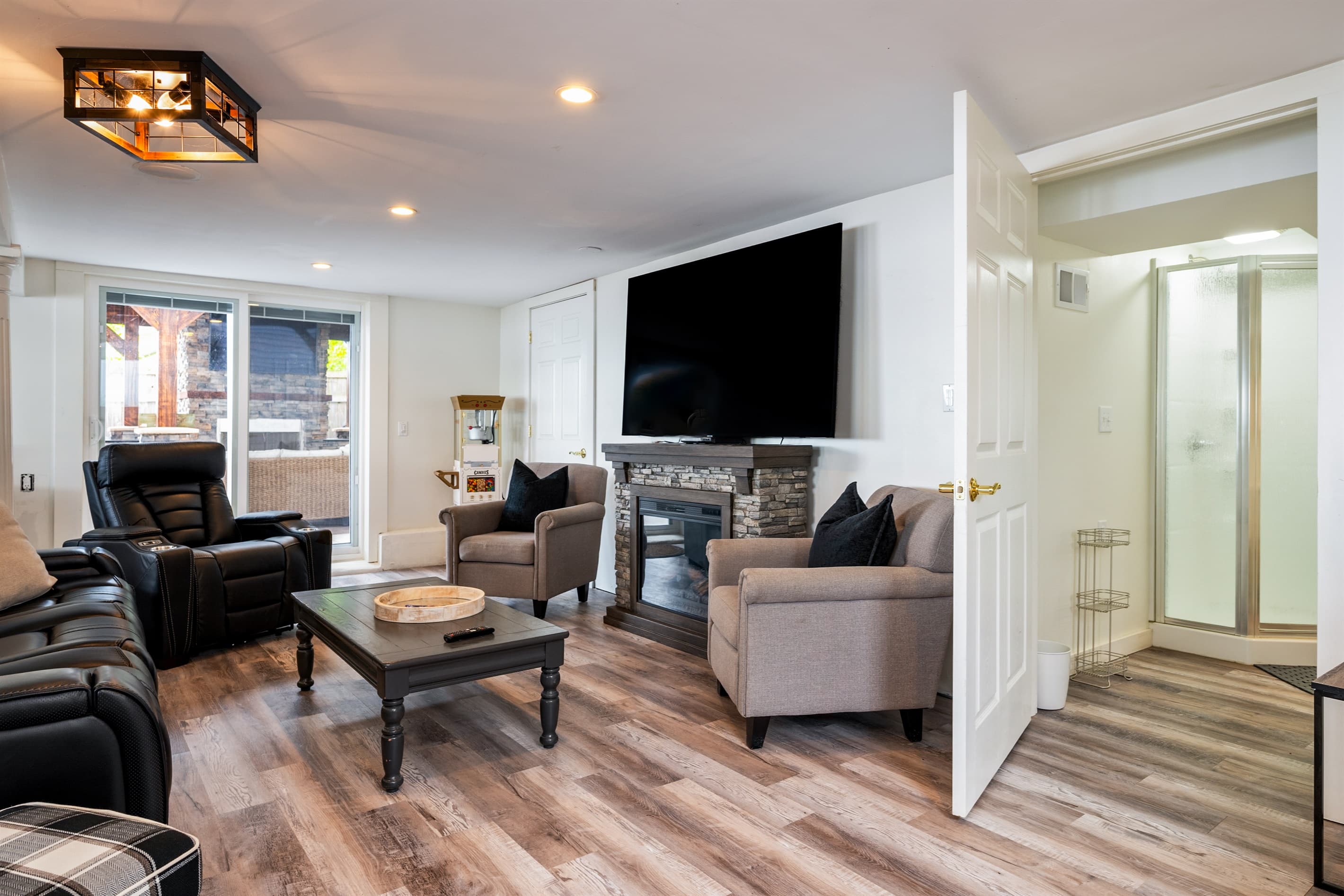 Entertainment area with fireplace and television