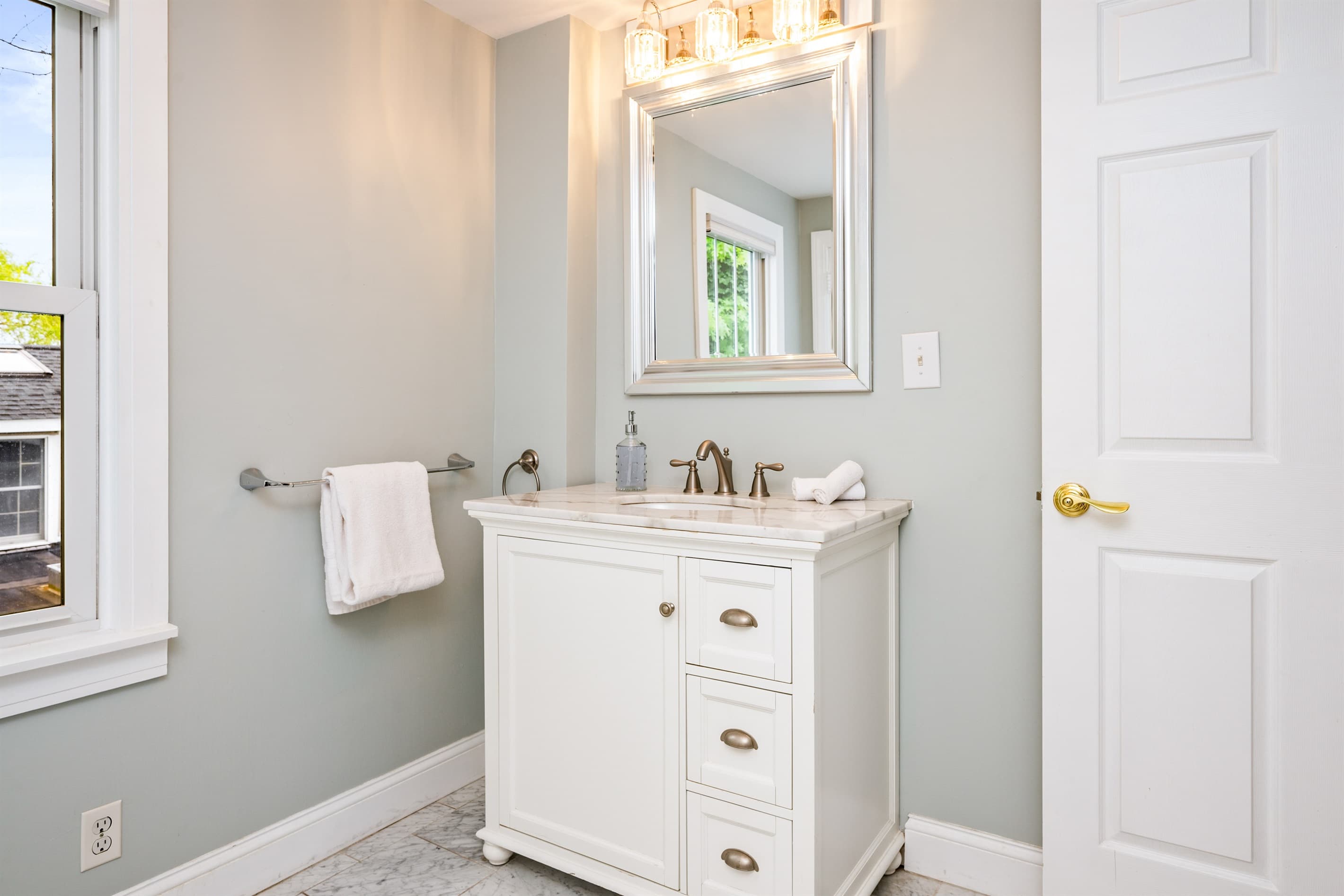 Bathroom vanity with mirrored cabinet