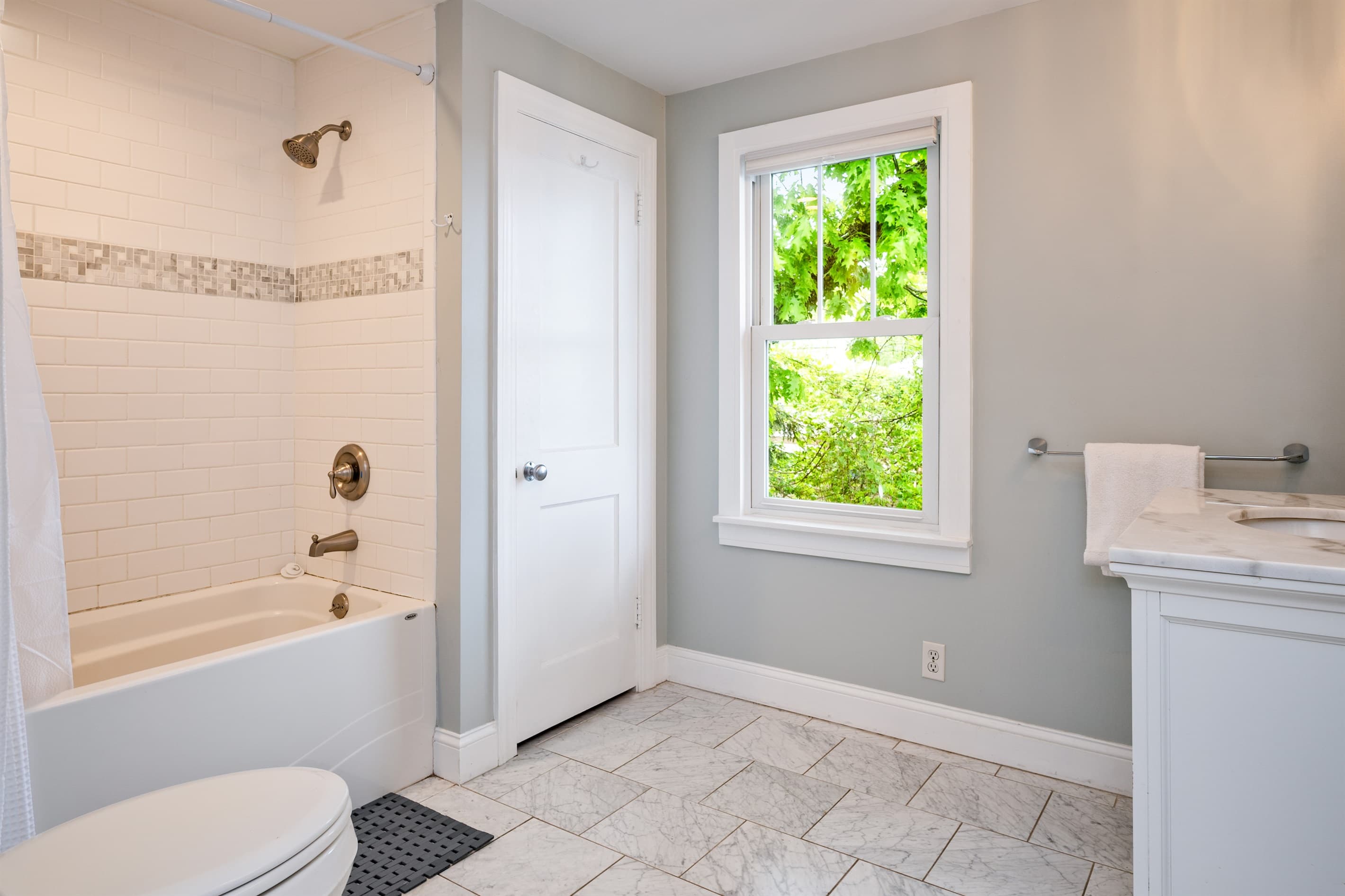 Full bathroom with deep soaking tub