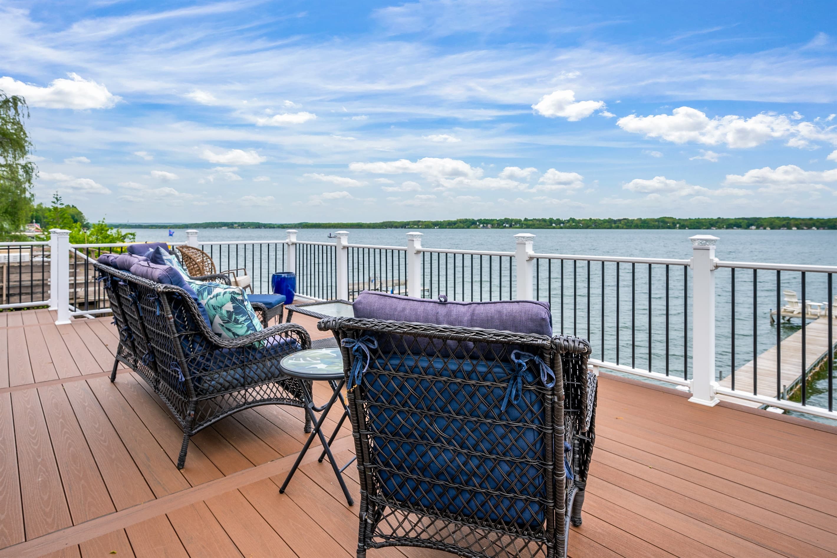 Waterfront seating beneath blue skies