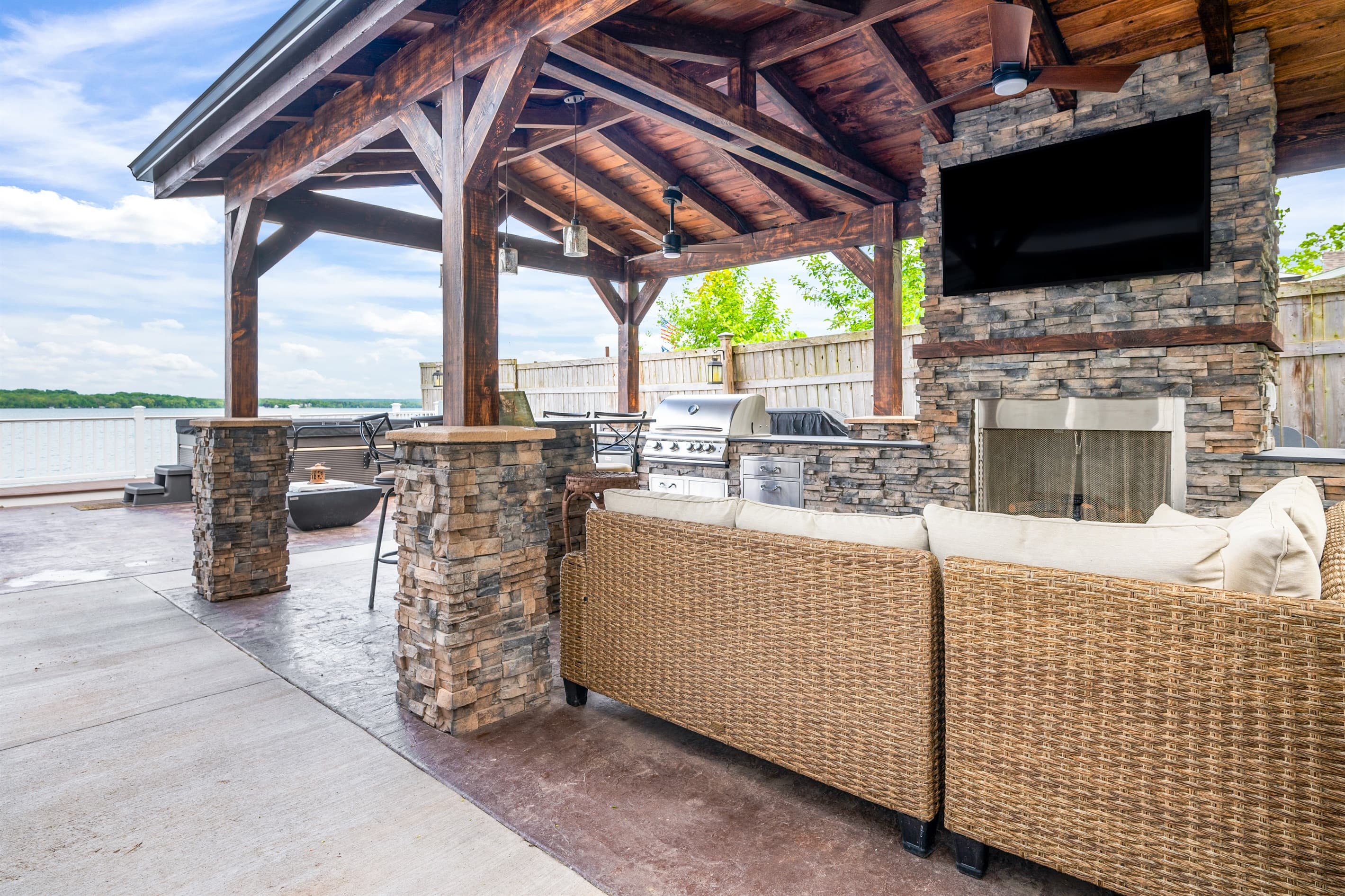 Outdoor kitchen beneath the wooden pavilion
