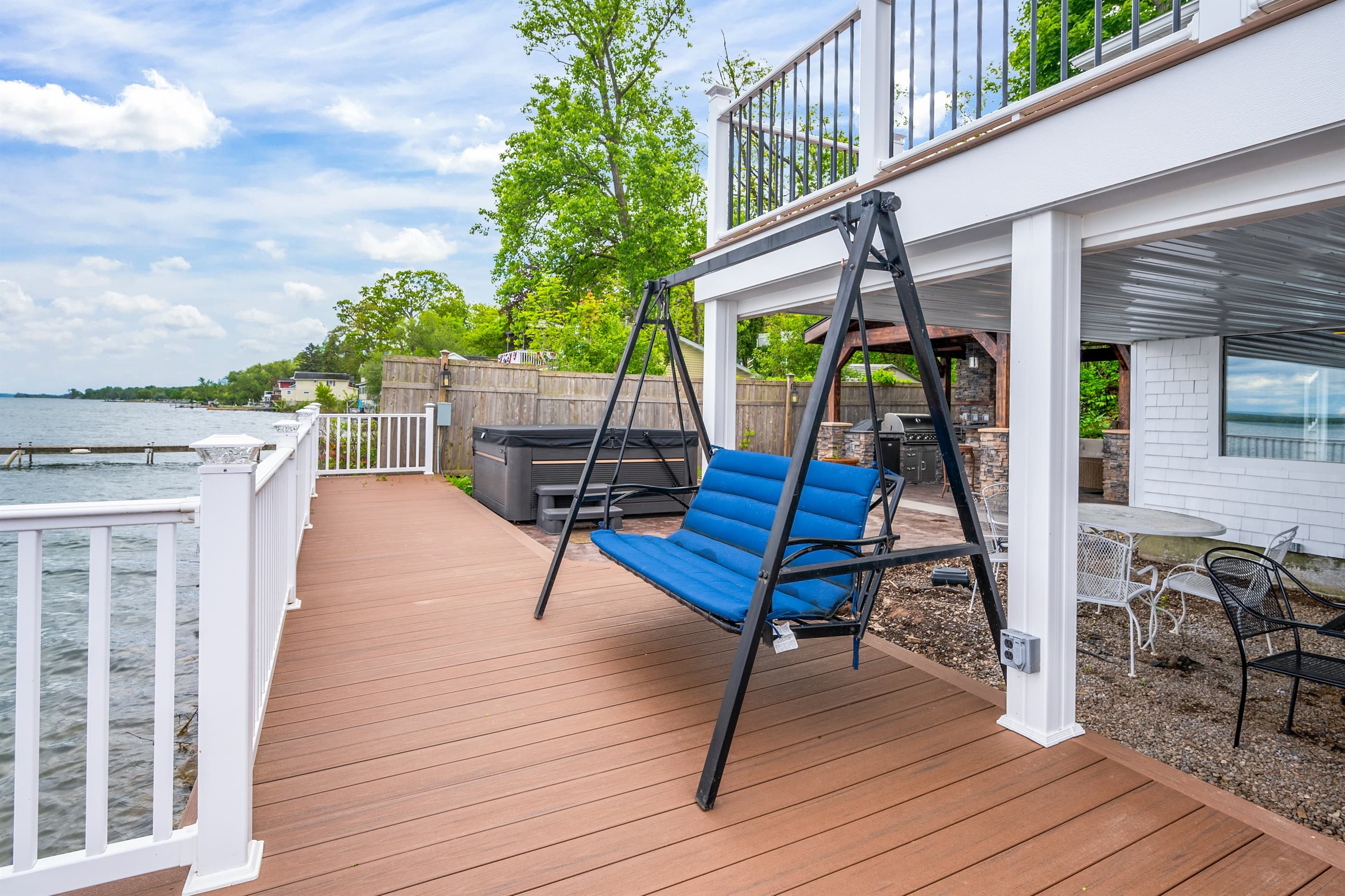 Deck swing positioned beside the hot tub