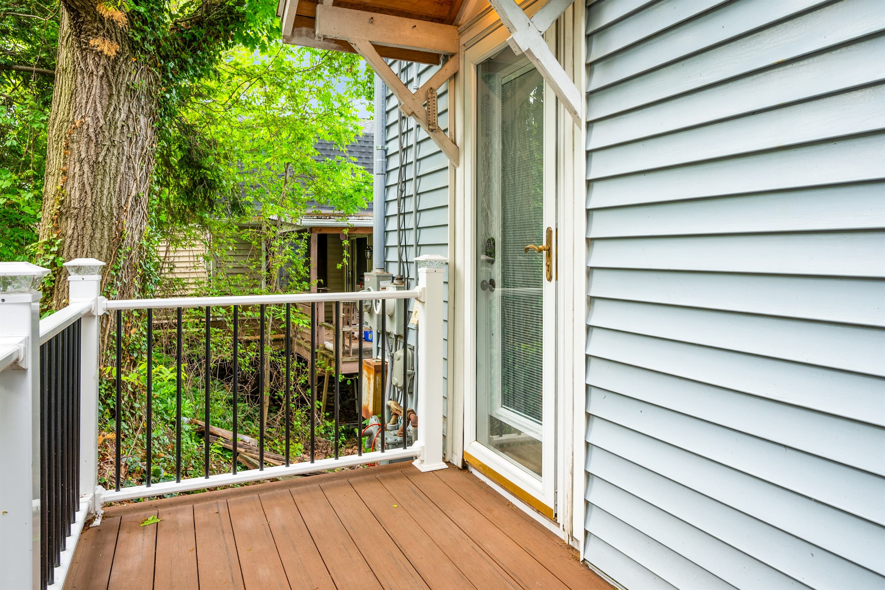 Private deck walkway alongside the house