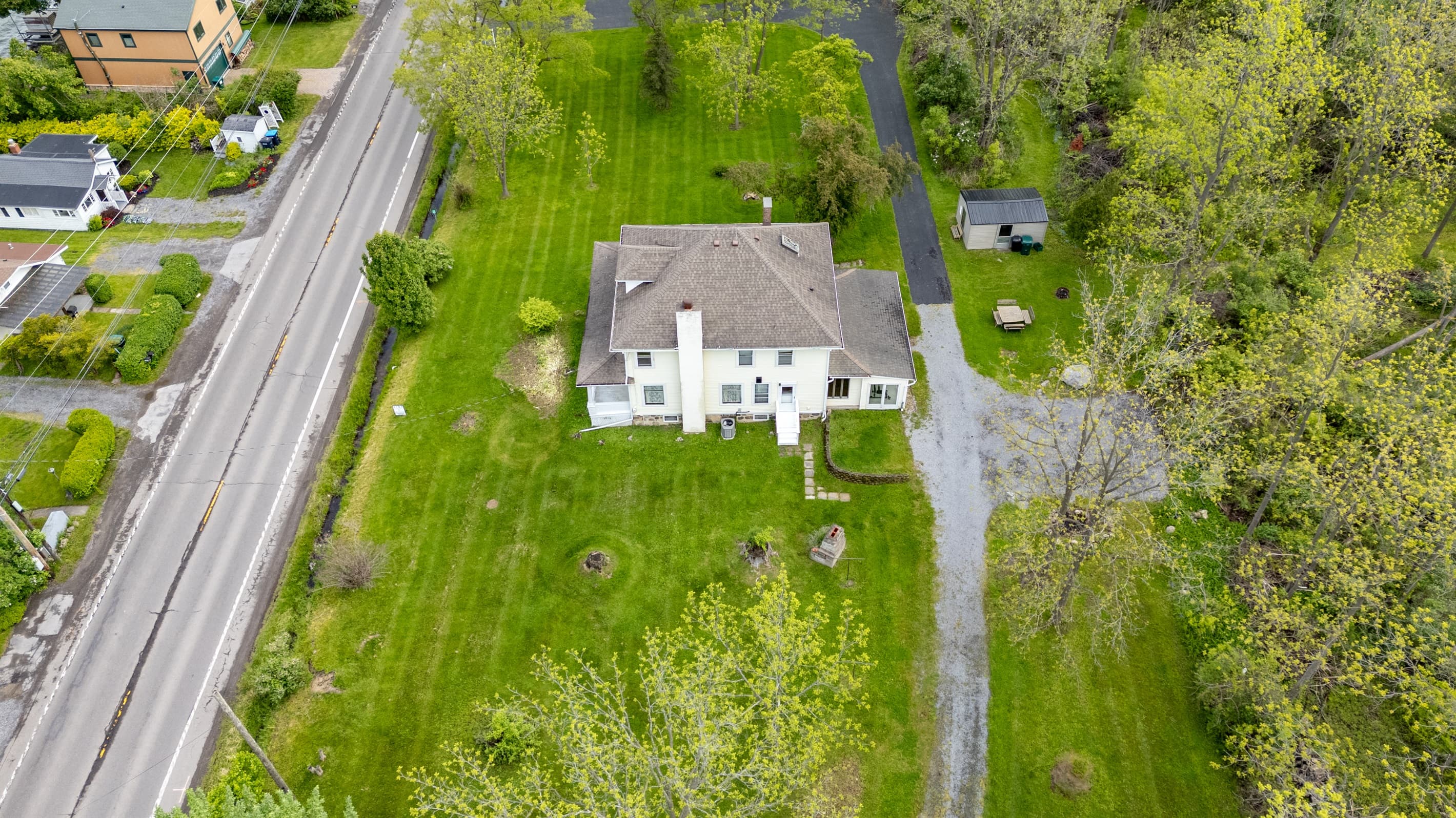 Aerial view of house beside roadway