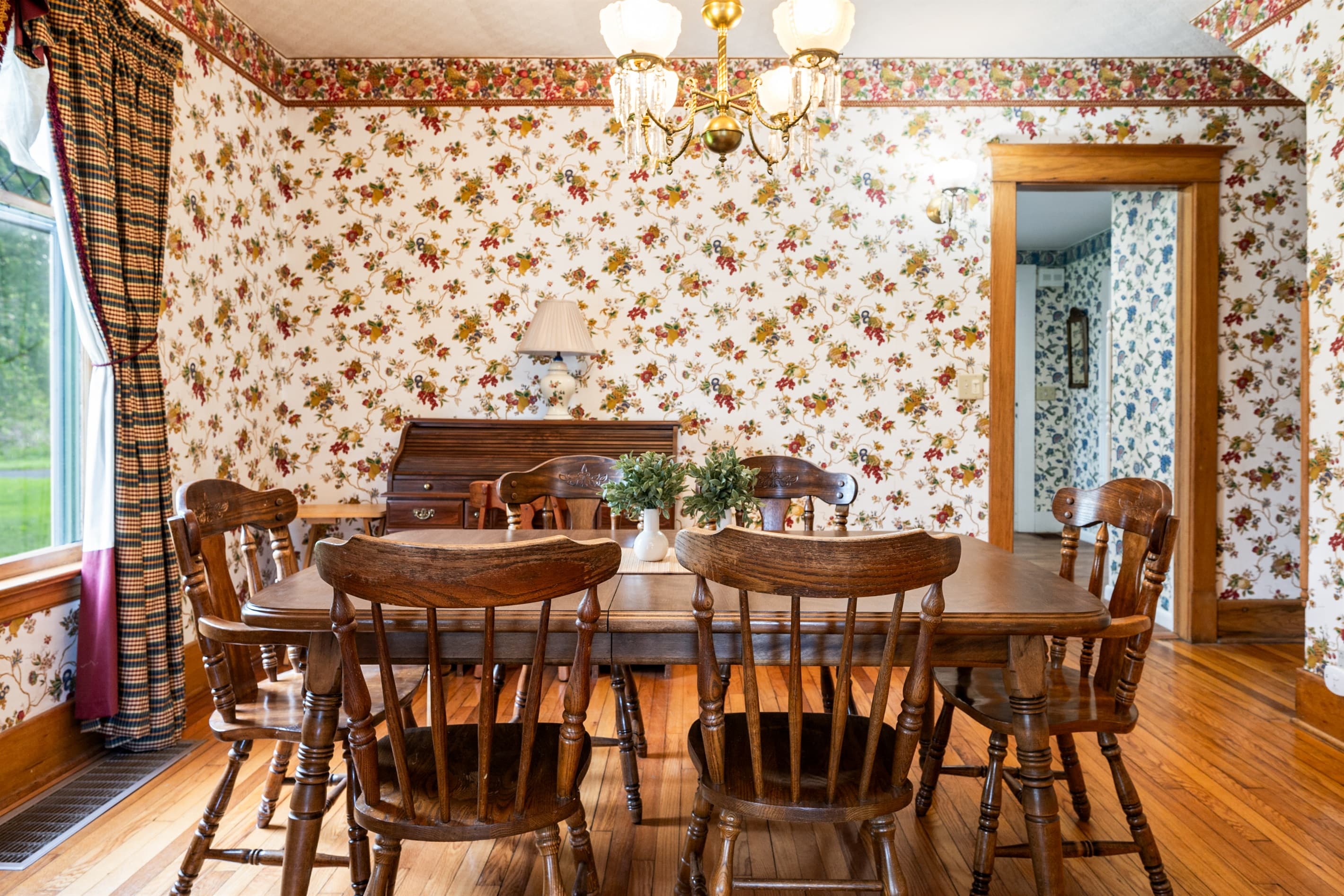 Dining room with long wooden table