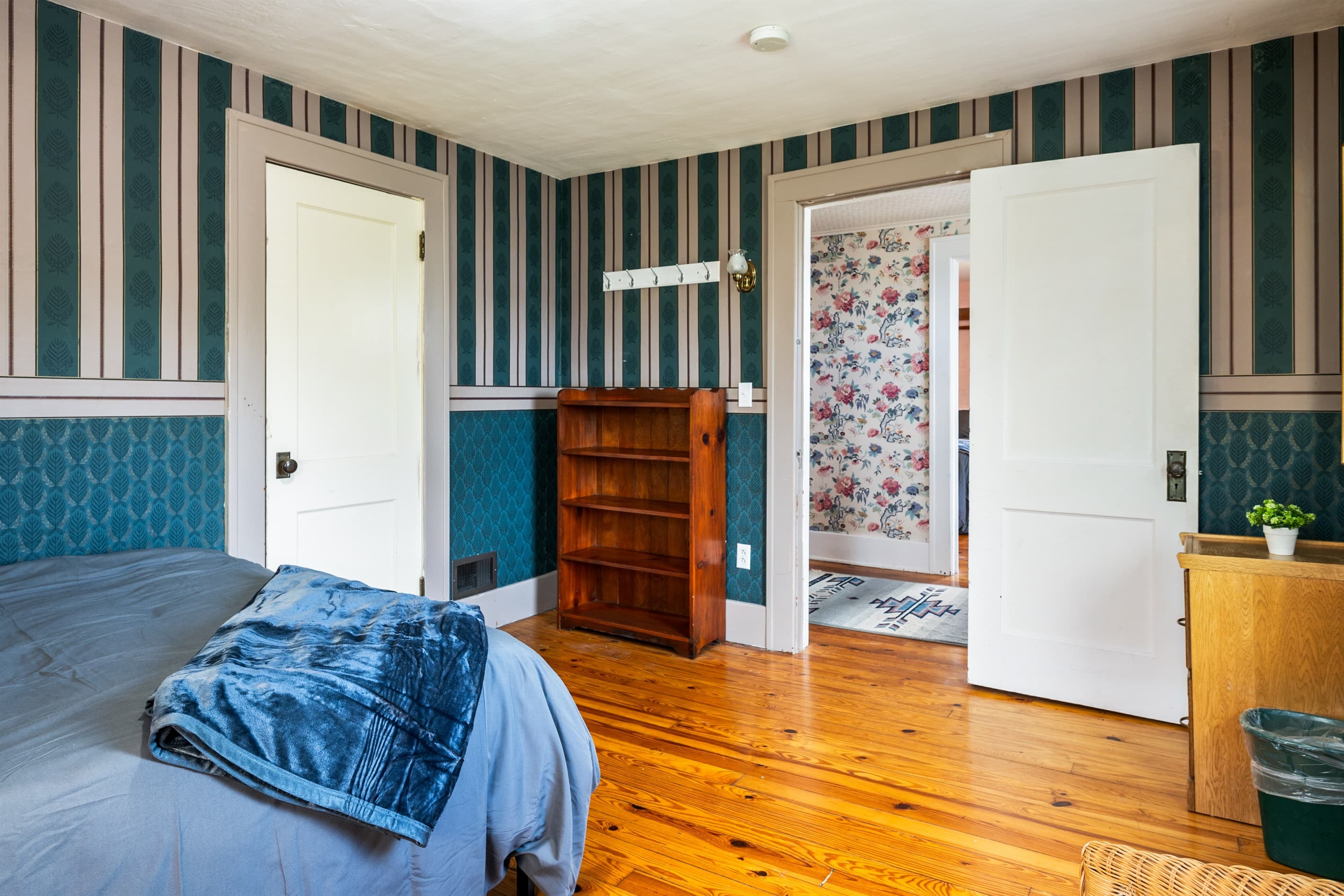 Bedroom with dark metal bed frame