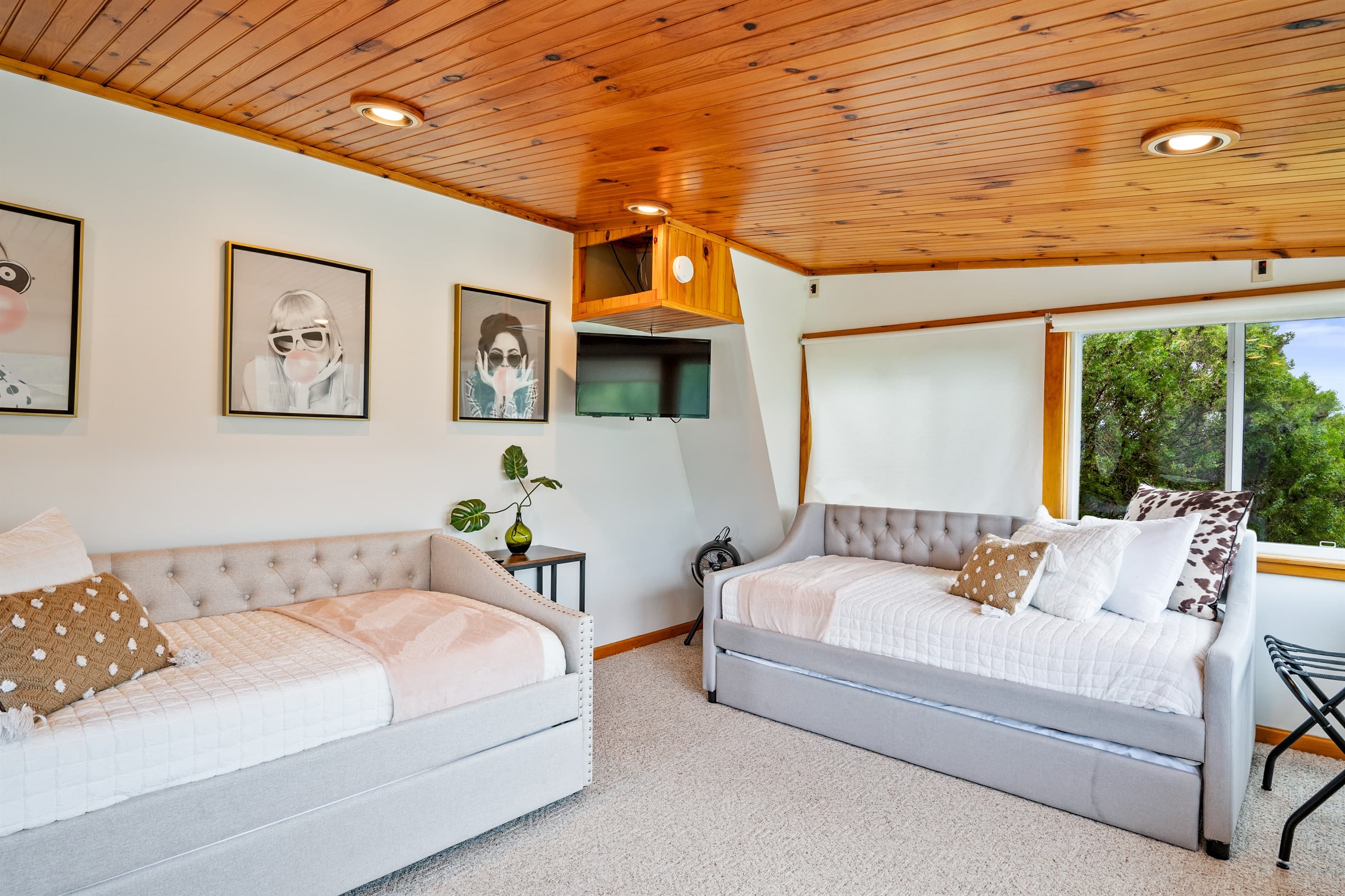 Day beds beside bedroom windows