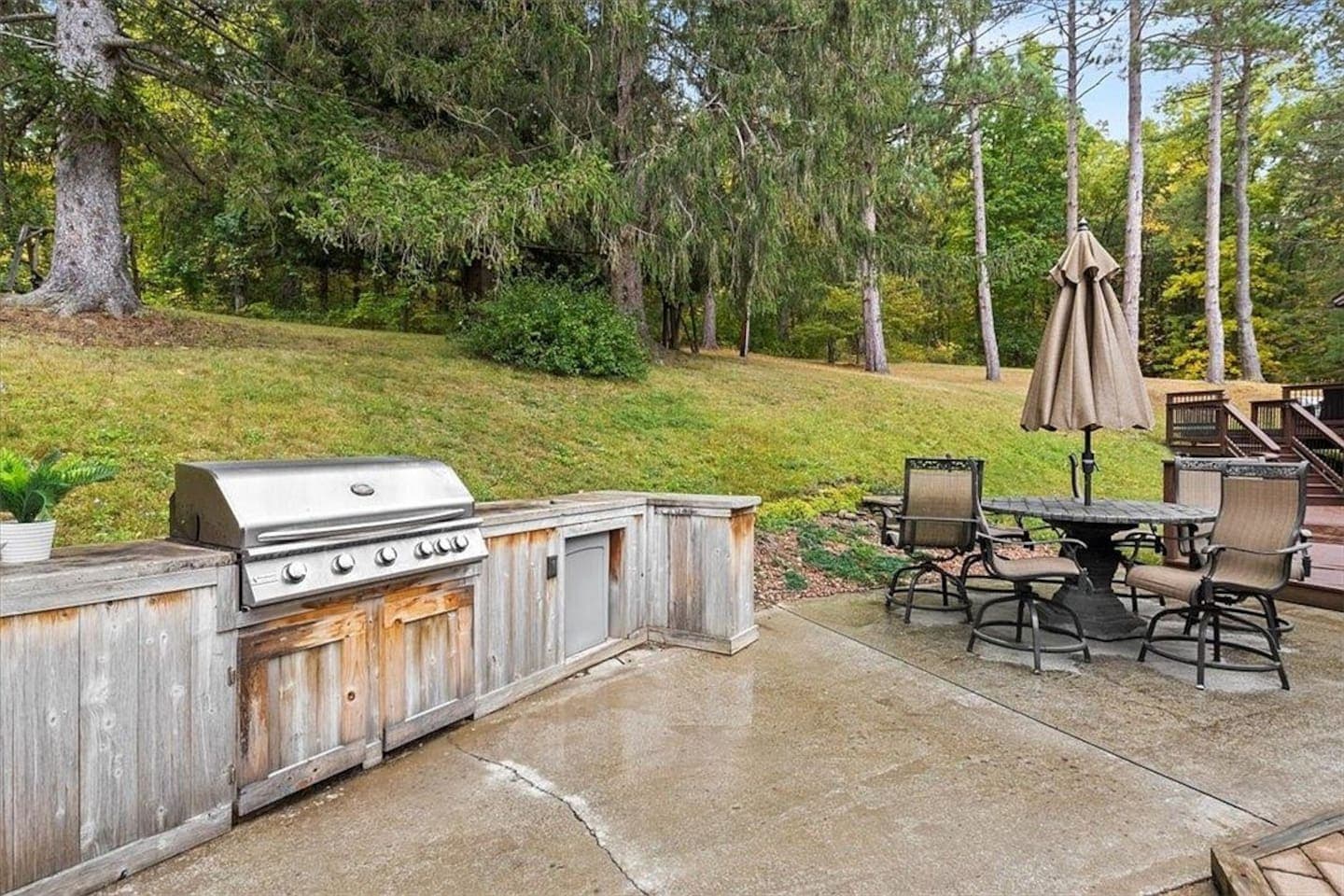 Outdoor dining table and grill 