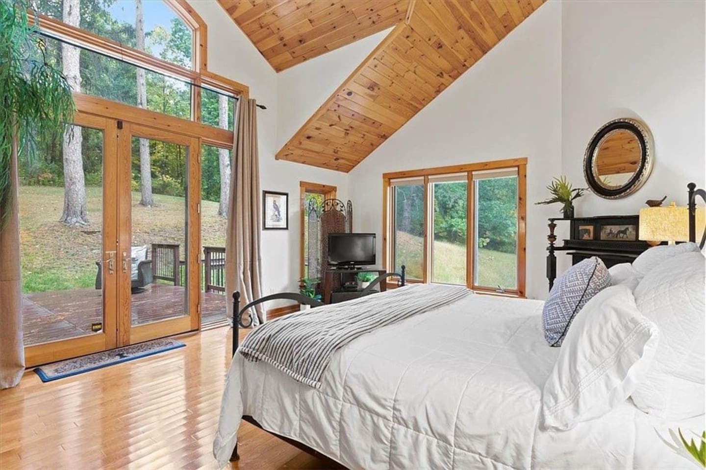 Bedroom with woodland views