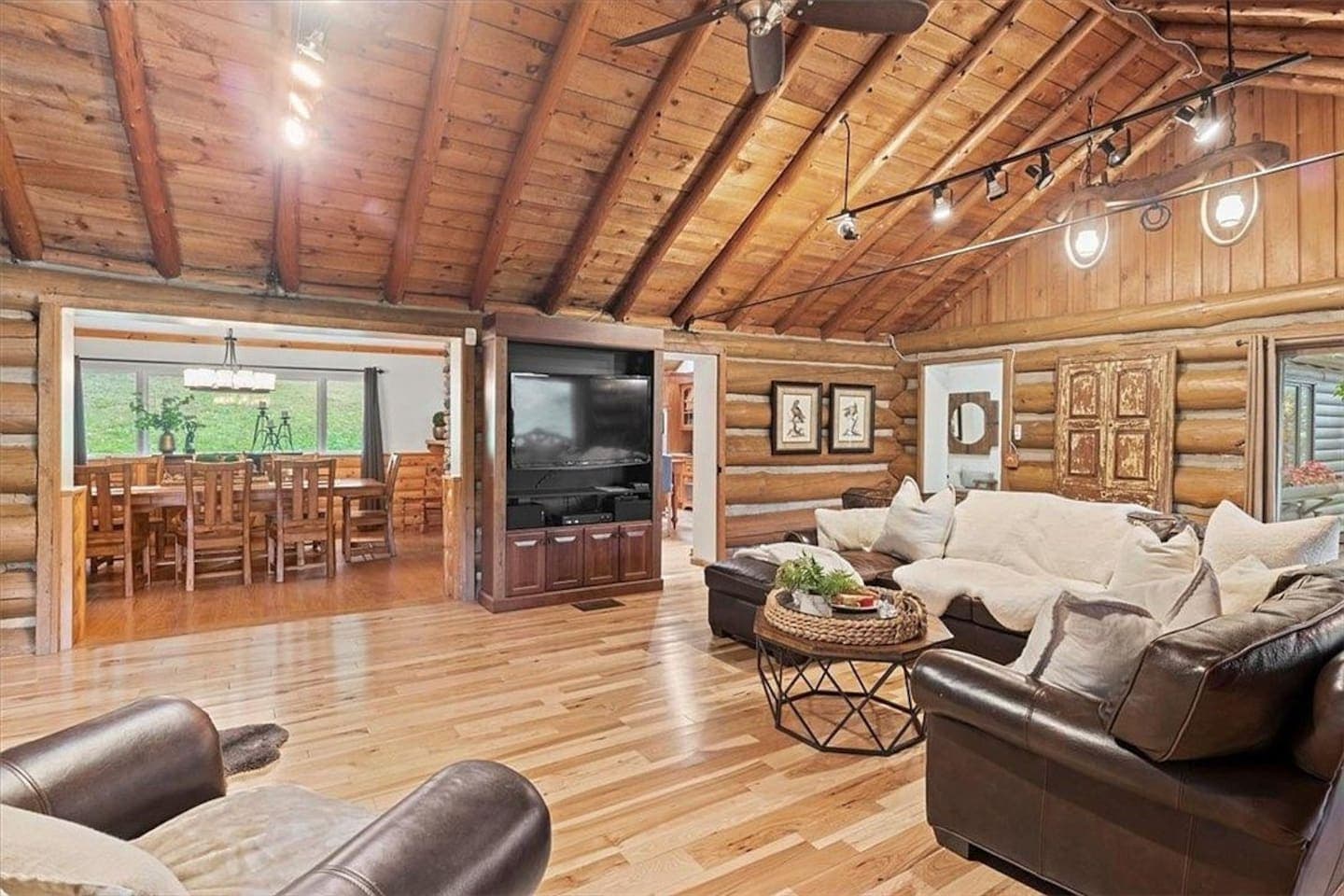 Sofa positioned opposite wall-mounted television