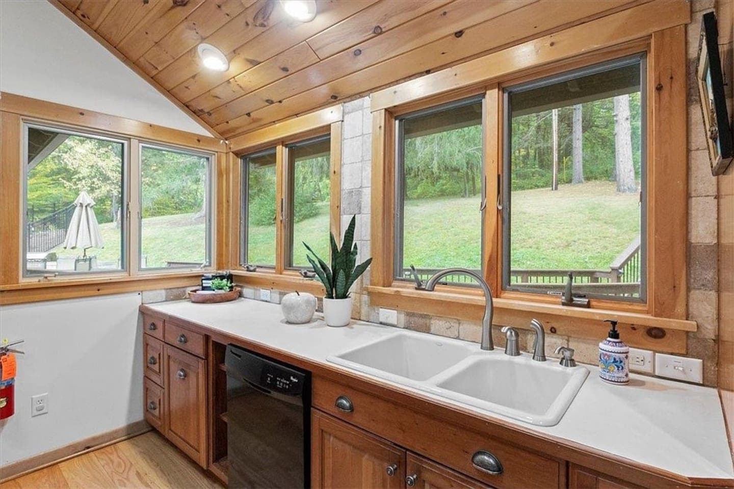 Kitchen sink beneath windows