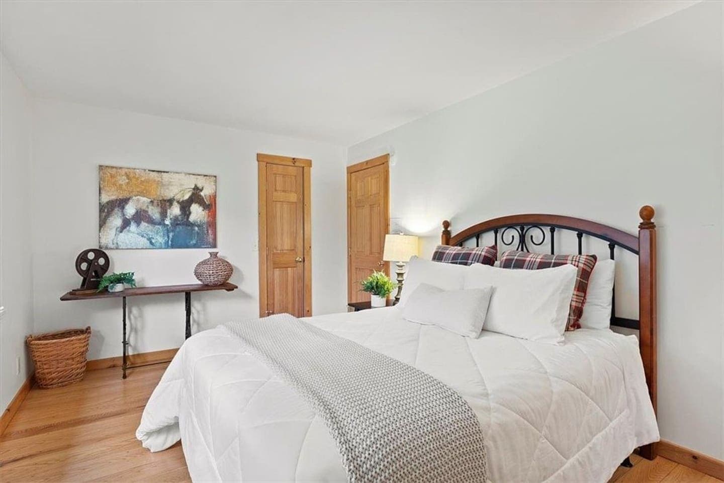 Wood-framed bed with matching console 