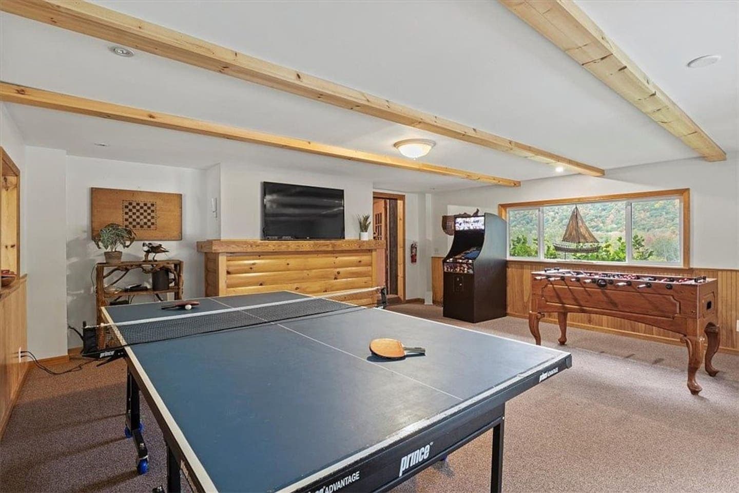 Game room with full-size ping-pong table