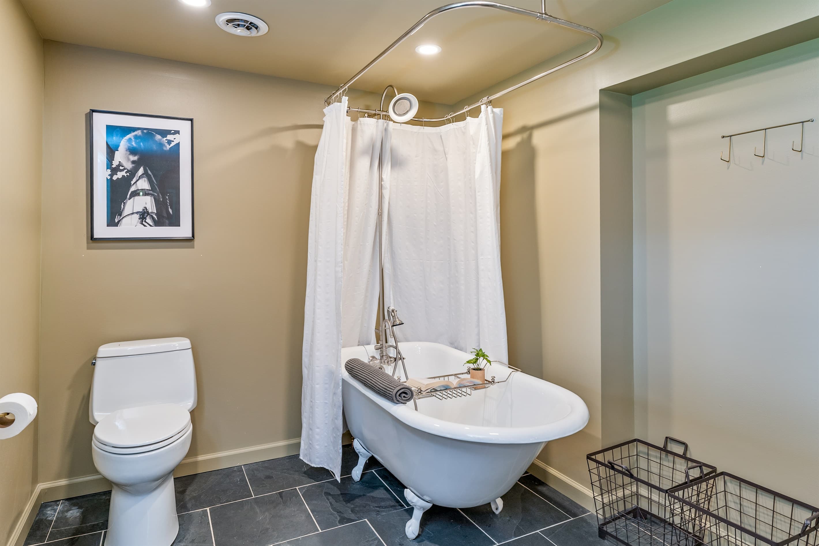 Bathroom with claw foot tub and toilet