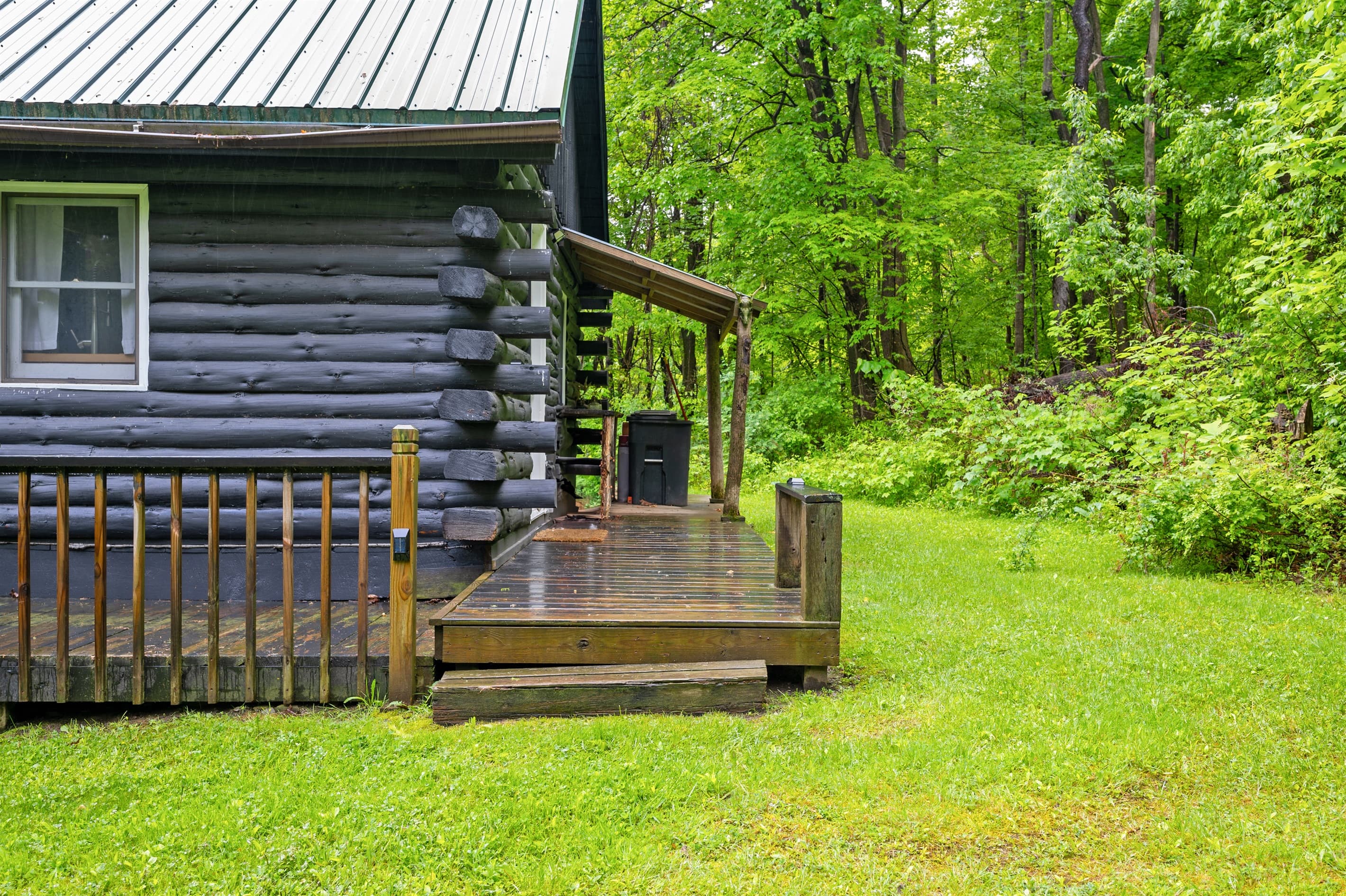 Front entry and small covered porch