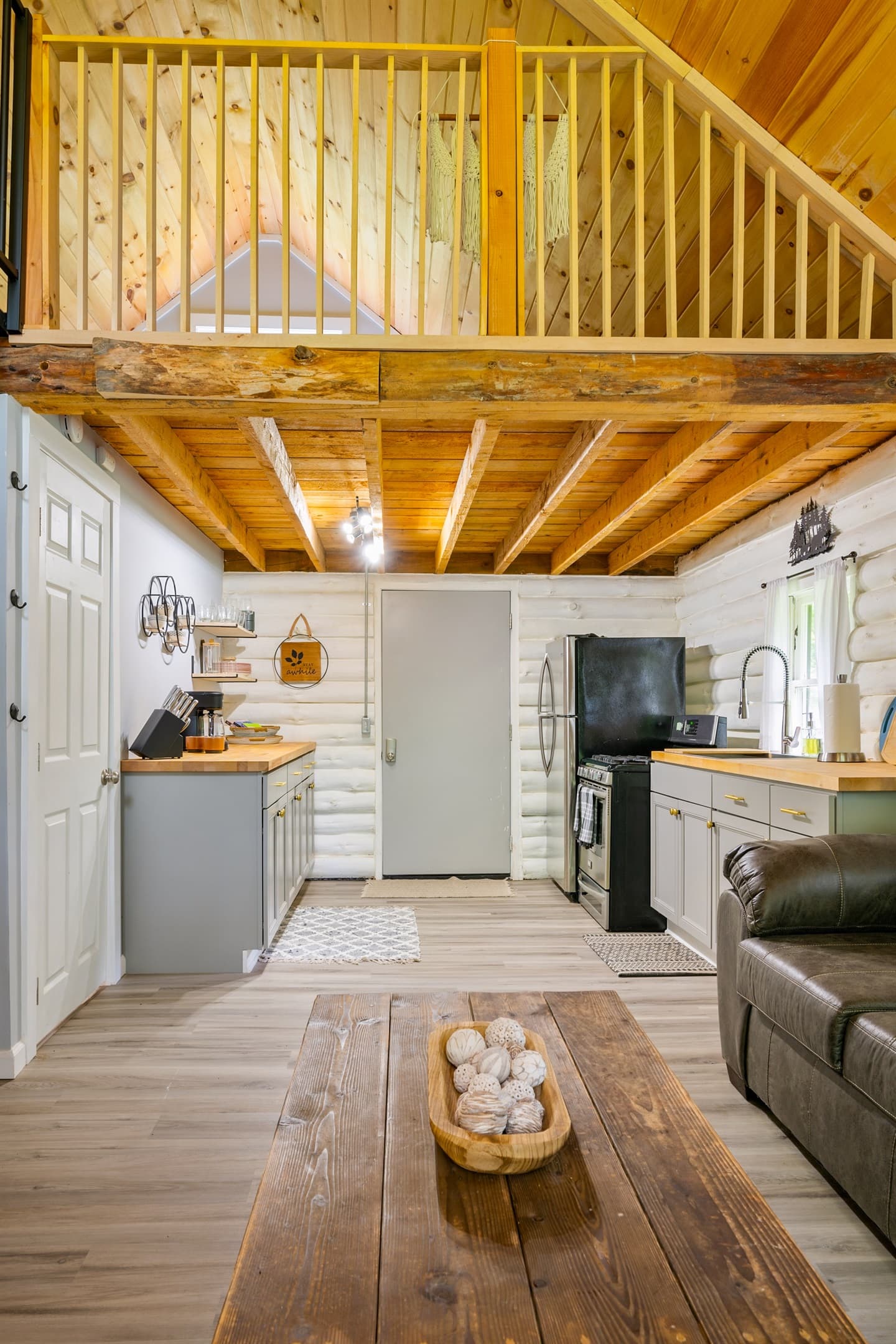 Kitchen with exposed wood ceiling beams
