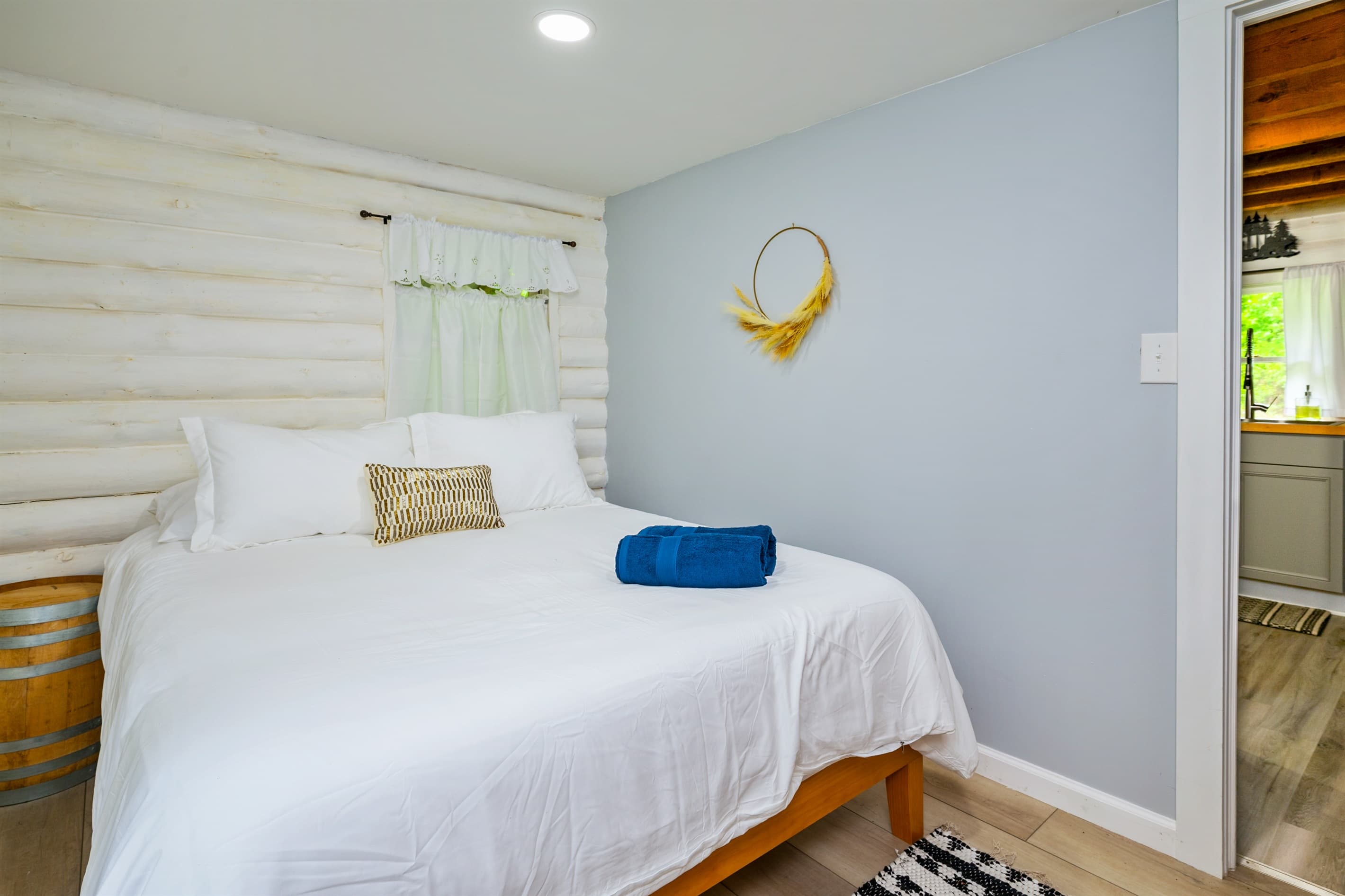 Queen bedroom with white bedding