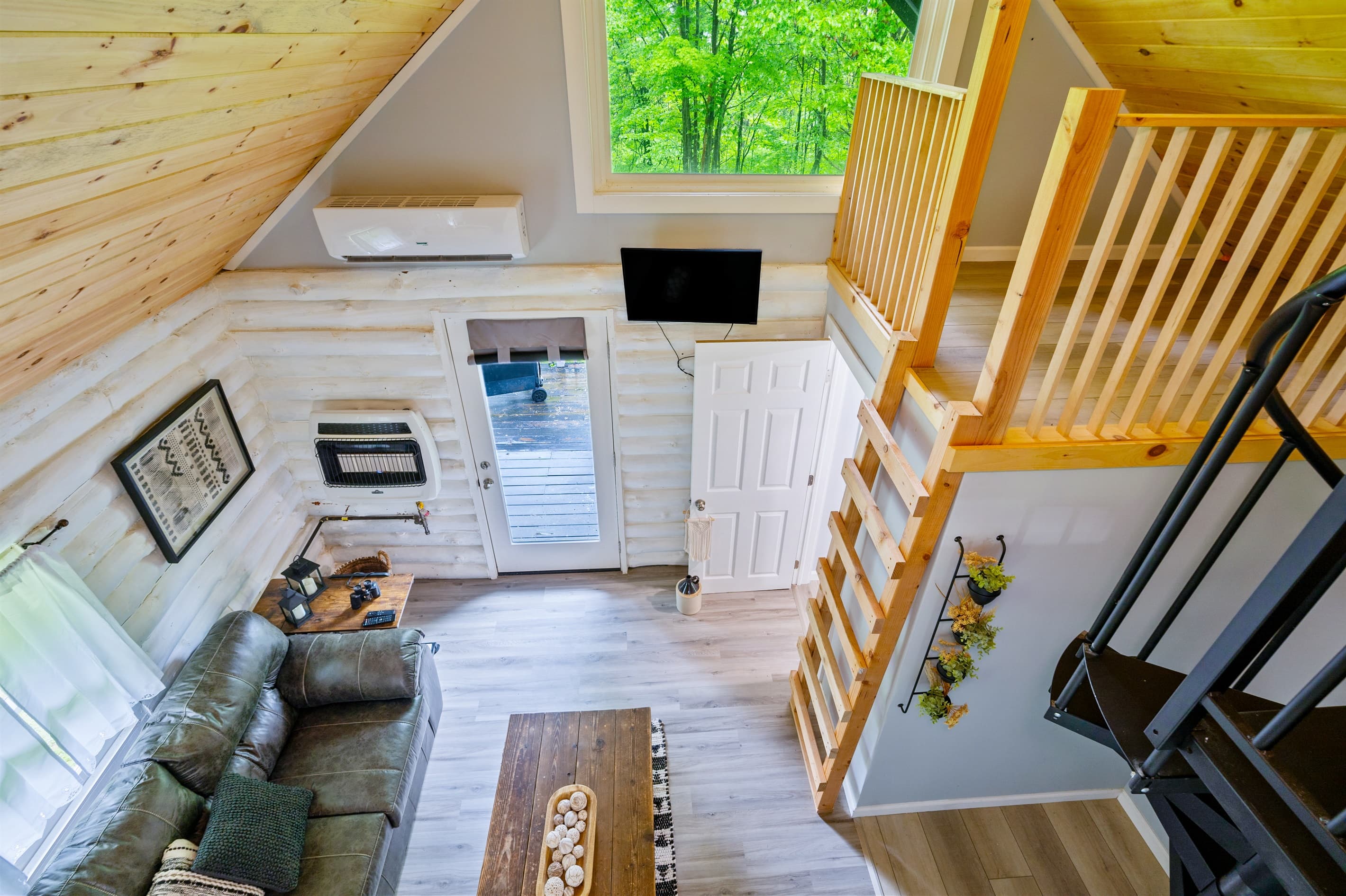 Open living room viewed from the loft