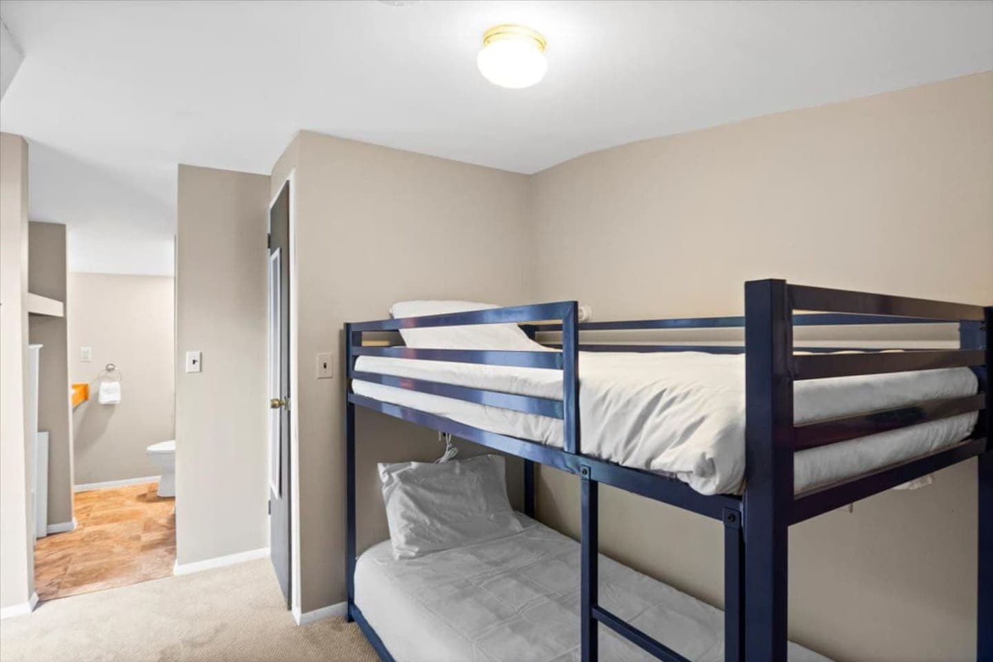 Bunk room with blue bunk beds