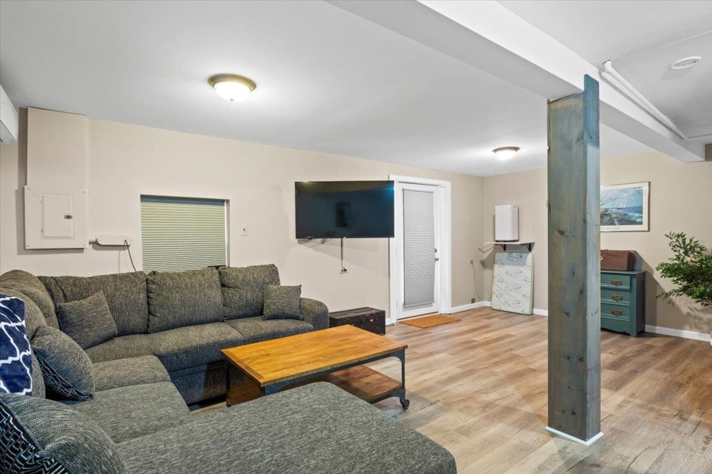 Sectional sofa facing wall-mounted television