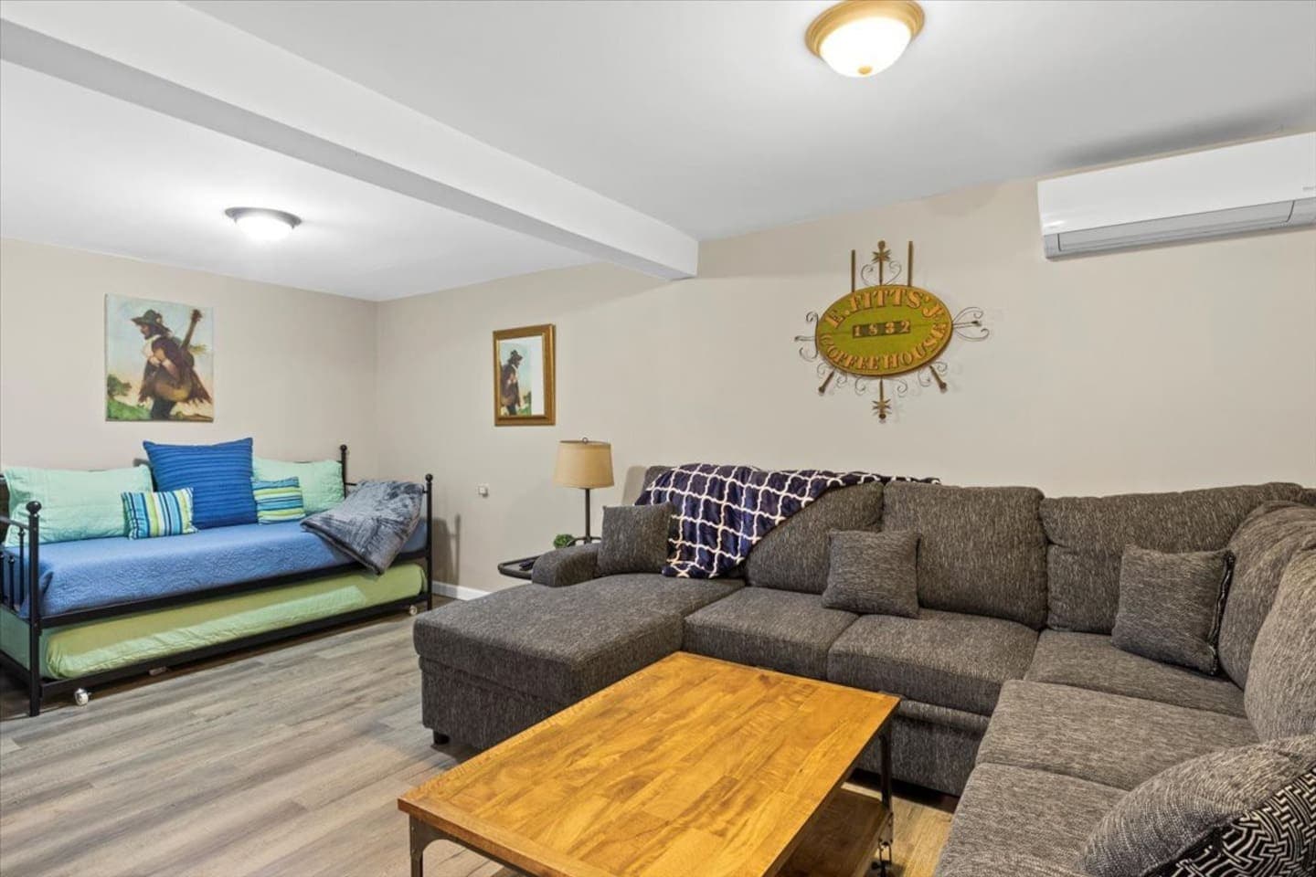 Sectional beside a pull out sofa bed