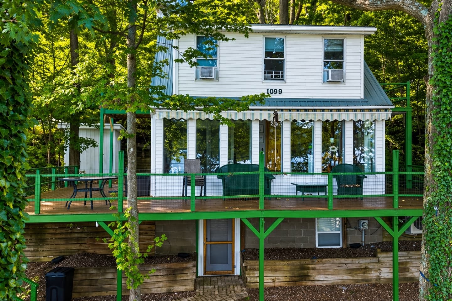 Multi-level deck surrounded by trees