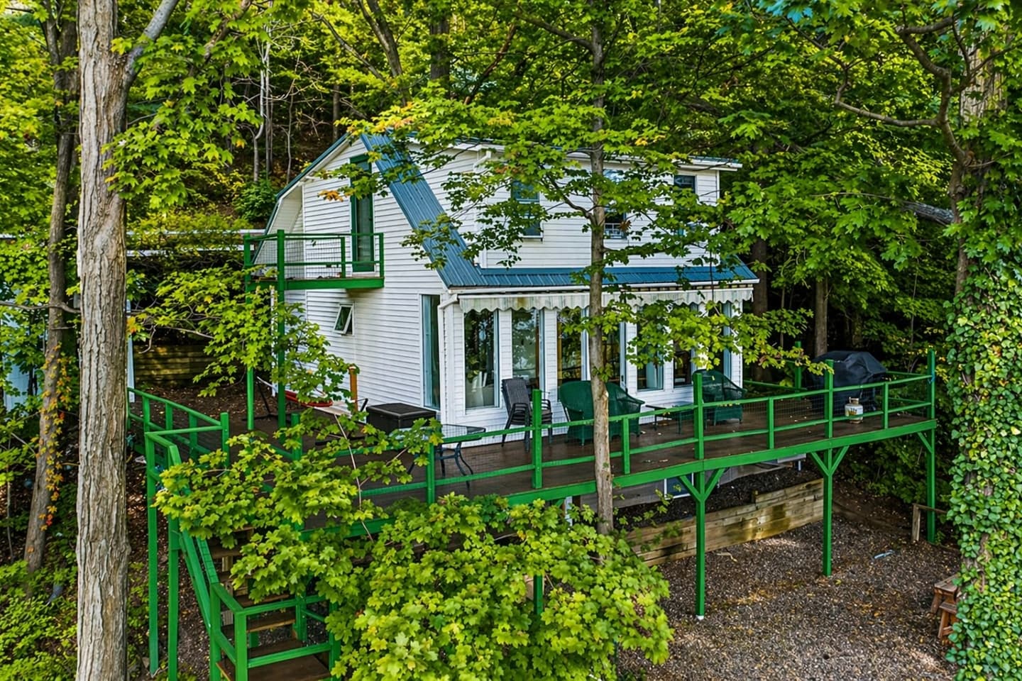 Side view of the wooded property