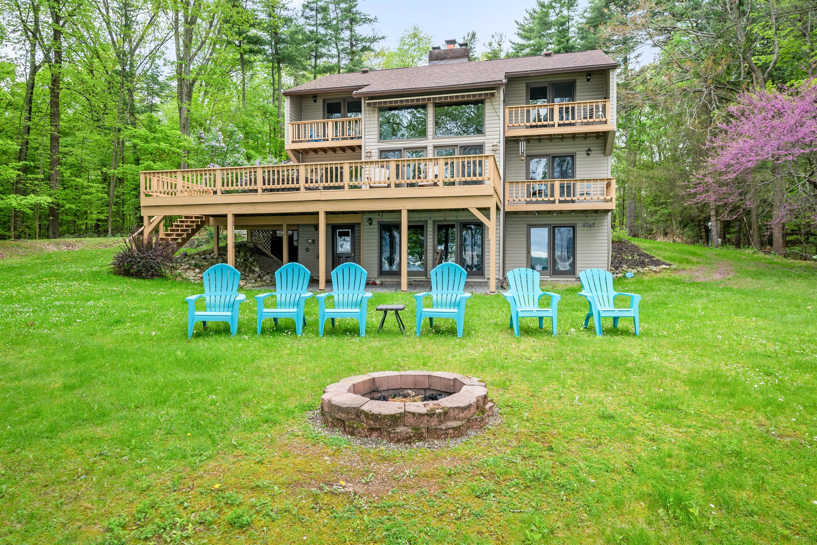 Multi-level lakefront home with spacious lawn