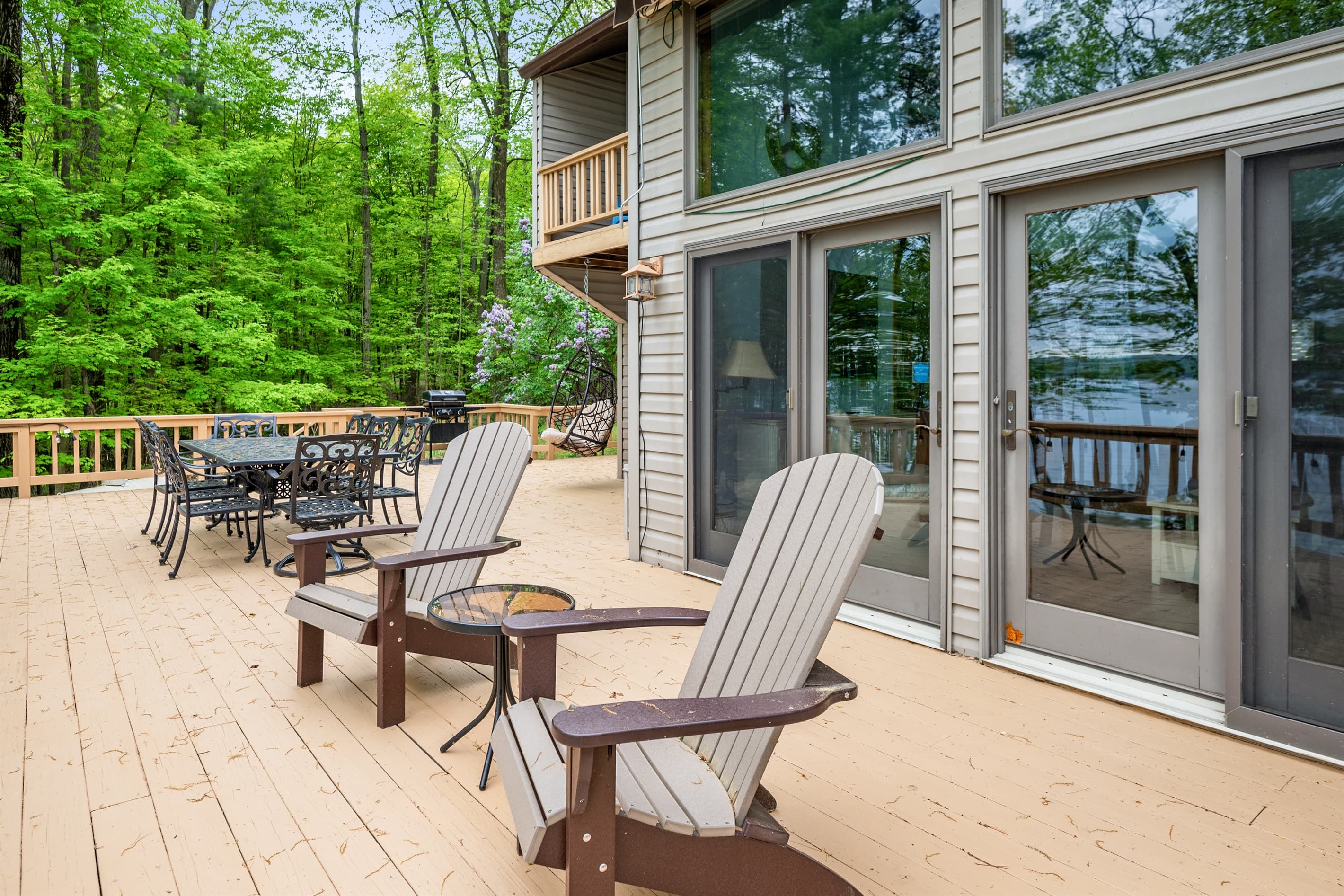 Outdoor seating beside the lake-facing windows