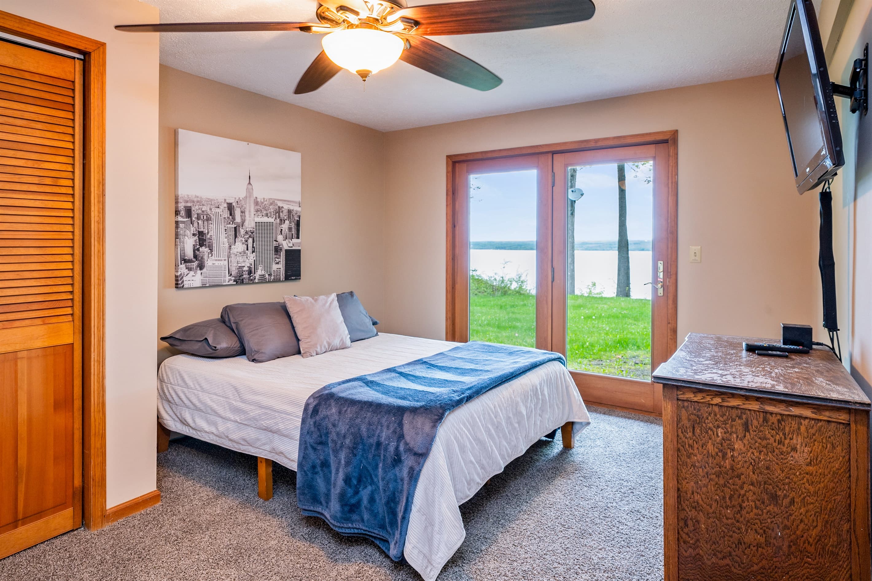 Bedroom with direct lake views