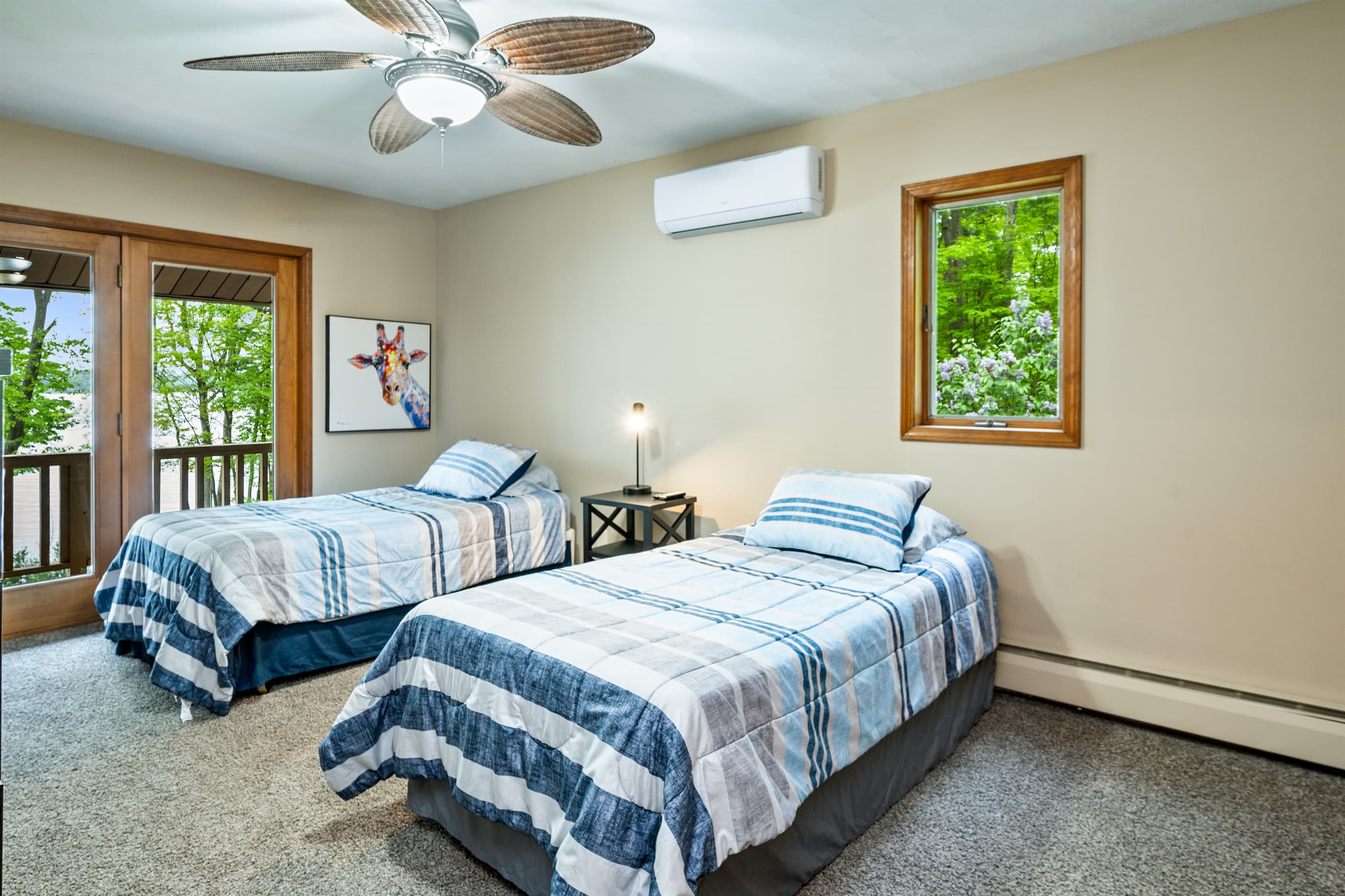 Twin bedroom with private balcony access