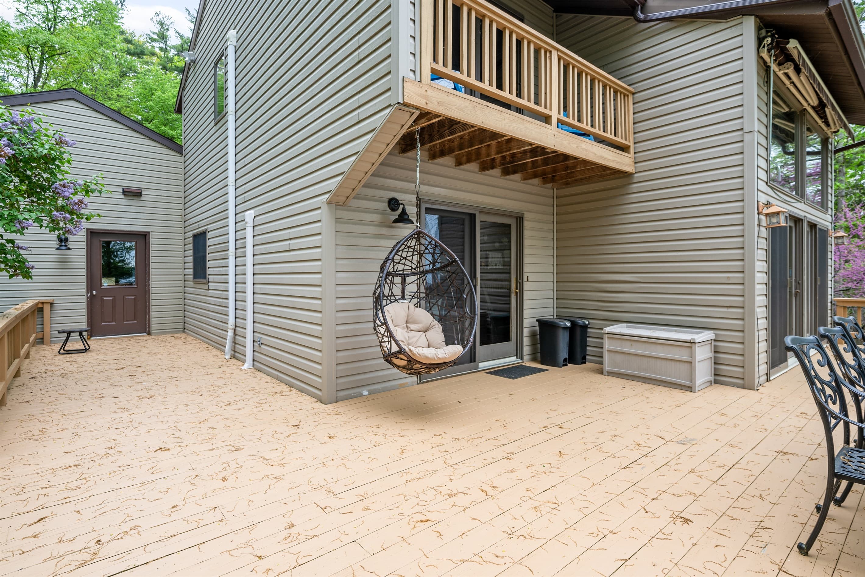 Deck seating with hanging egg chair